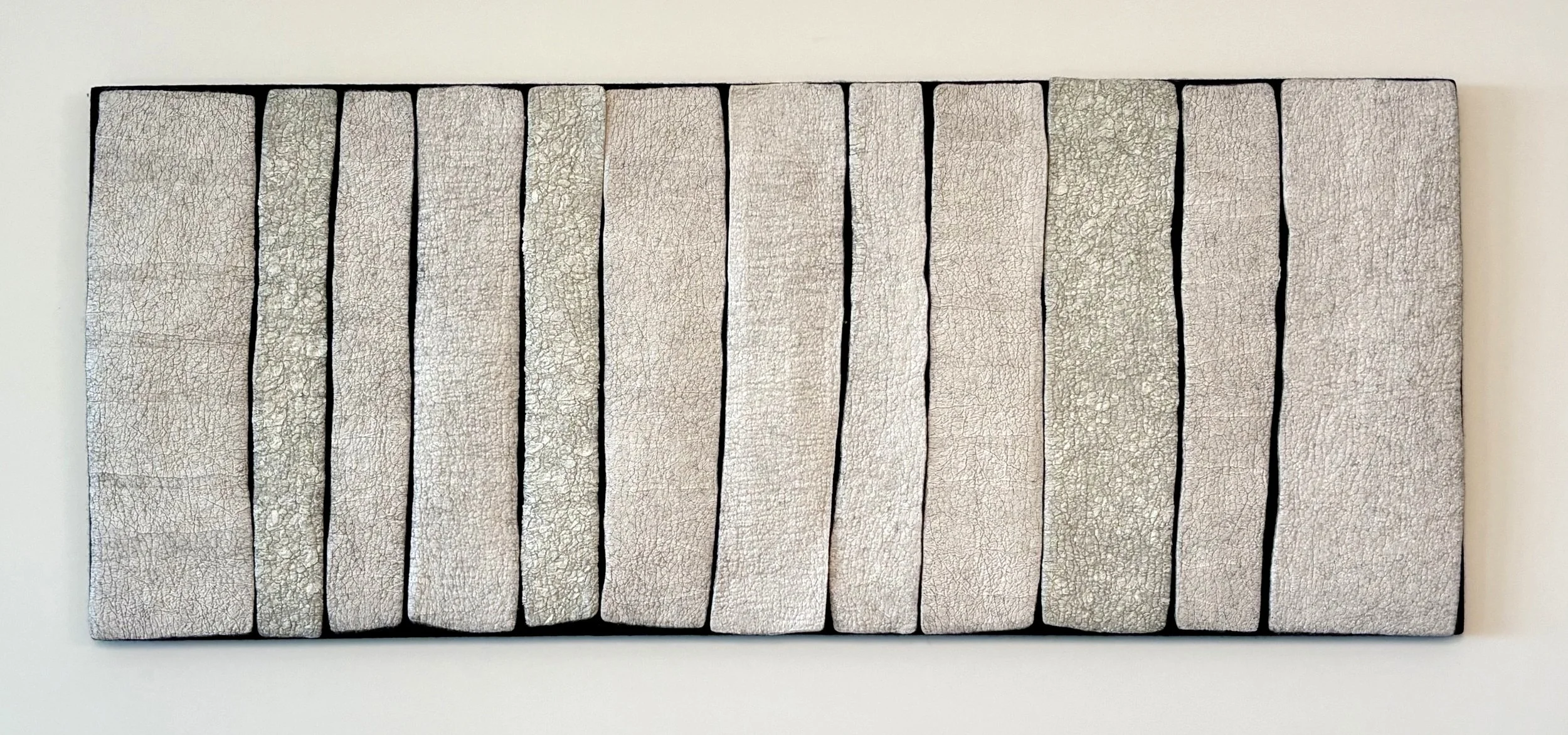 TEXTURE, 2026.  47"x19".  Wool, kozo paper.