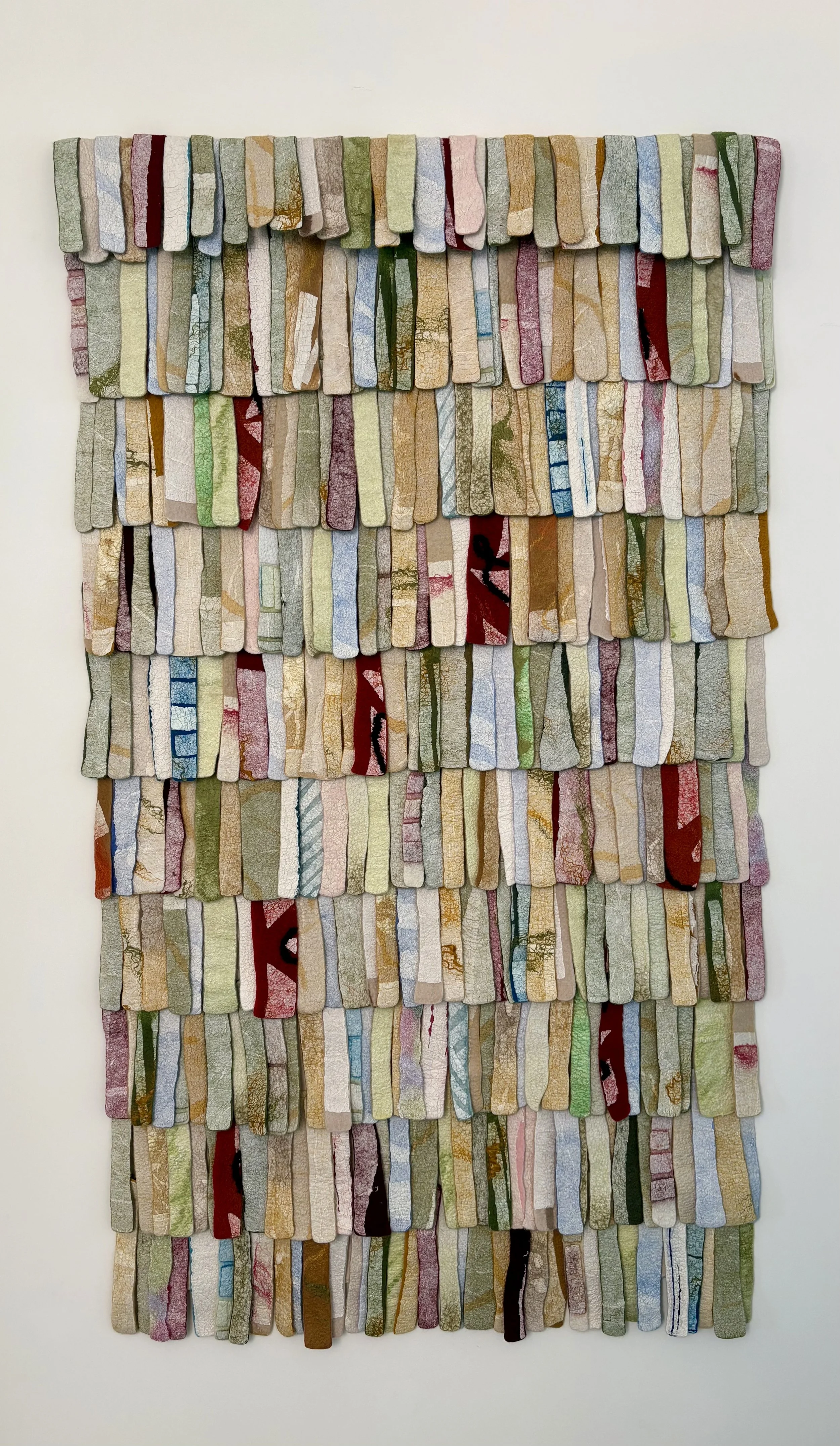 RECLAIM, 2026.  32"x55".  Wool, silk, paper, plant fibers.