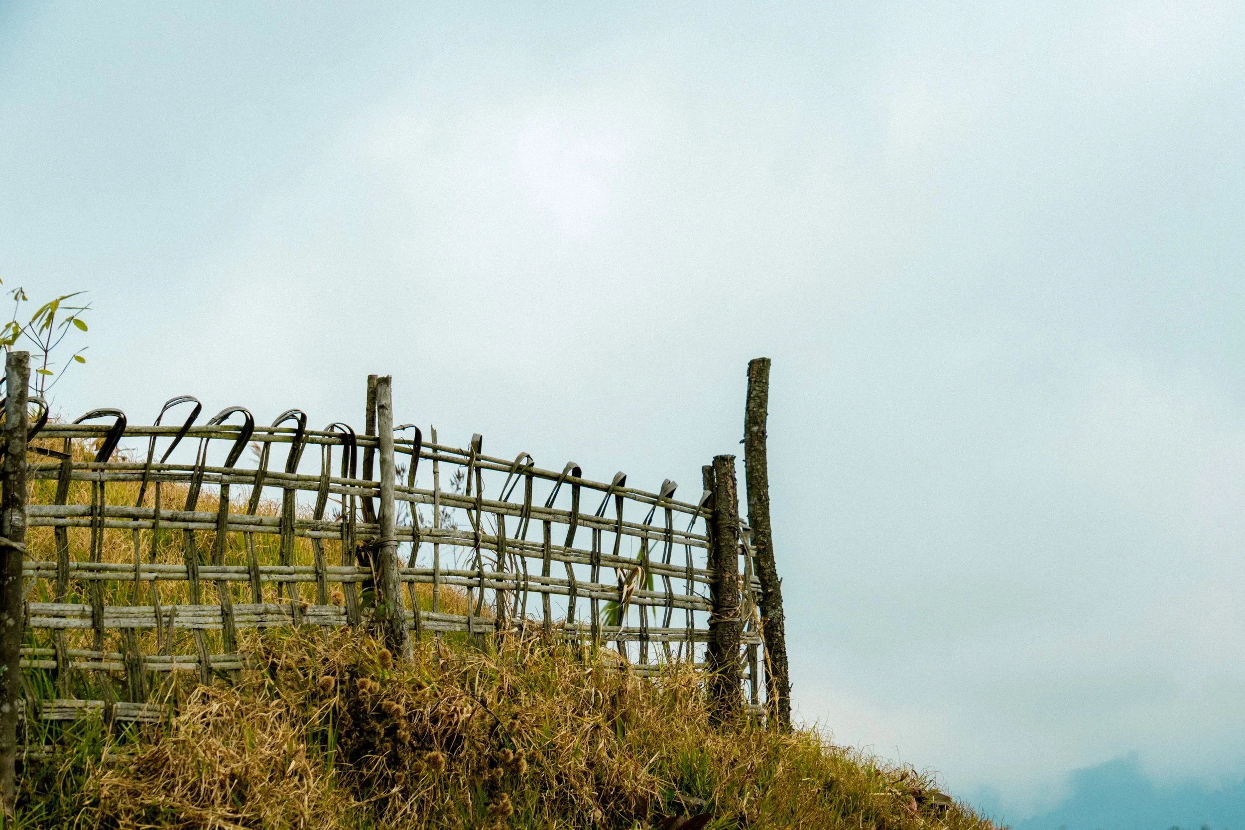 How to Handle a Sloped Yard When Installing a Fence
