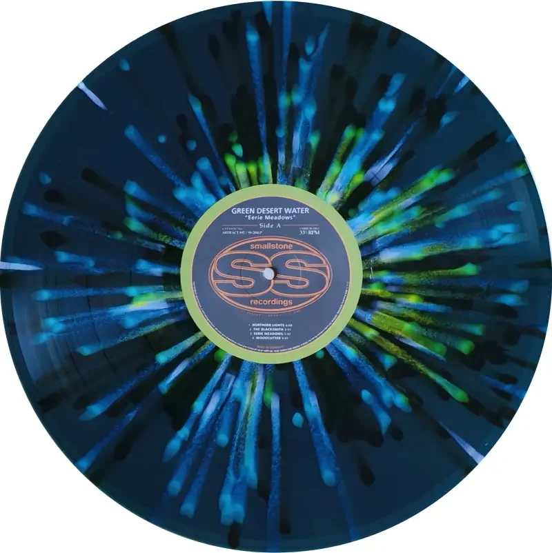 green-desert-water-eerie-meadows-blueorange-white-splatter-lp~2.webp