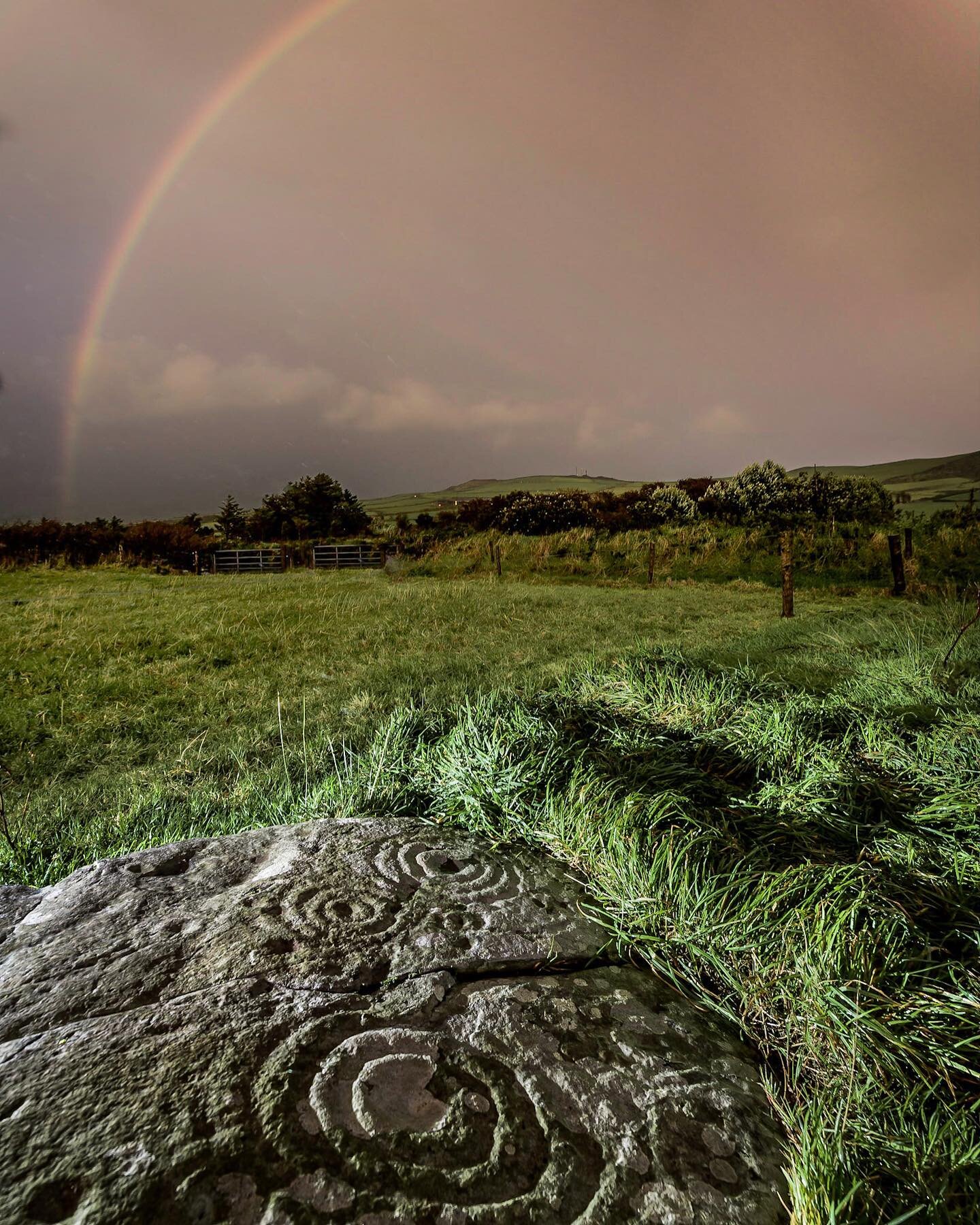 Aghacarrible Rock Art, Dingle, sharing on European Day of Rock Art. Caught this glowing rainbow at sunset on Monday evening last. #rockart #wildatlanticway #kerry #rainbow #rainshower #beautifulireland #cupandrings