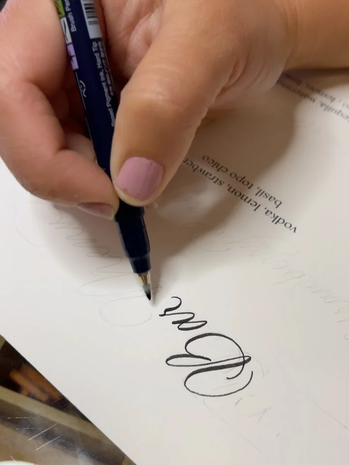 Late night and my favorite brush pen 🩶 
Hand created menus with a mix of print and calligraphy is such a beautiful and sophisticated combination. 

Please ignore my desperate need for a manicure 😅

#calligraphymenus #brushlettering #calligraphy #ev