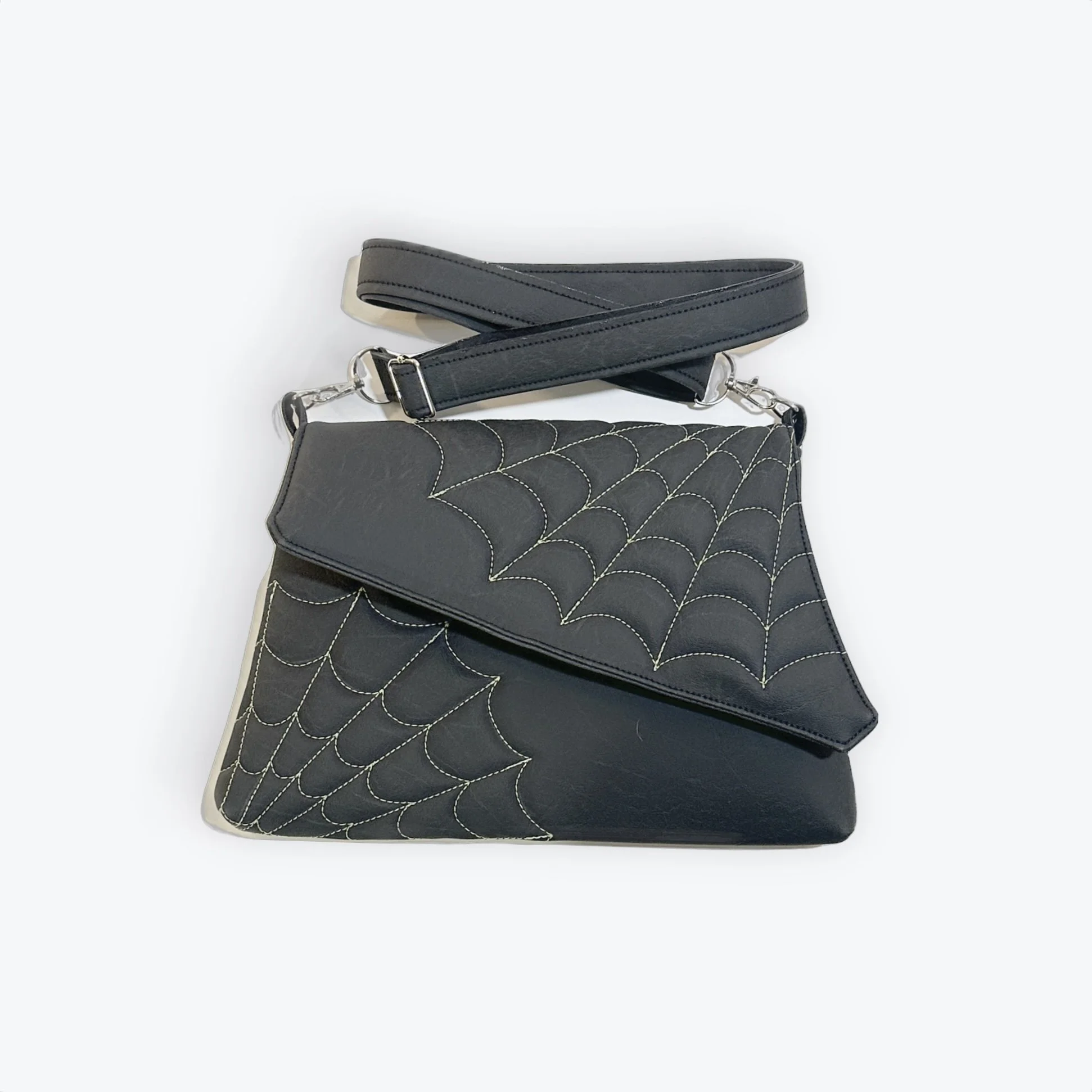 Double green Spiderweb Carrara Black Clutch 1.jpg