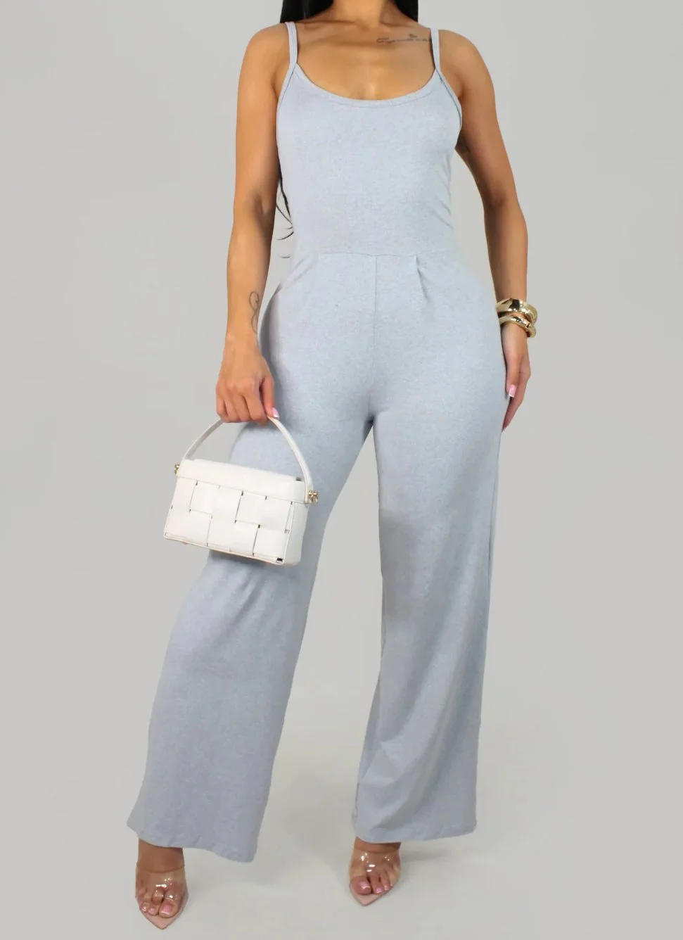 Woman in Grey Jumpsuit