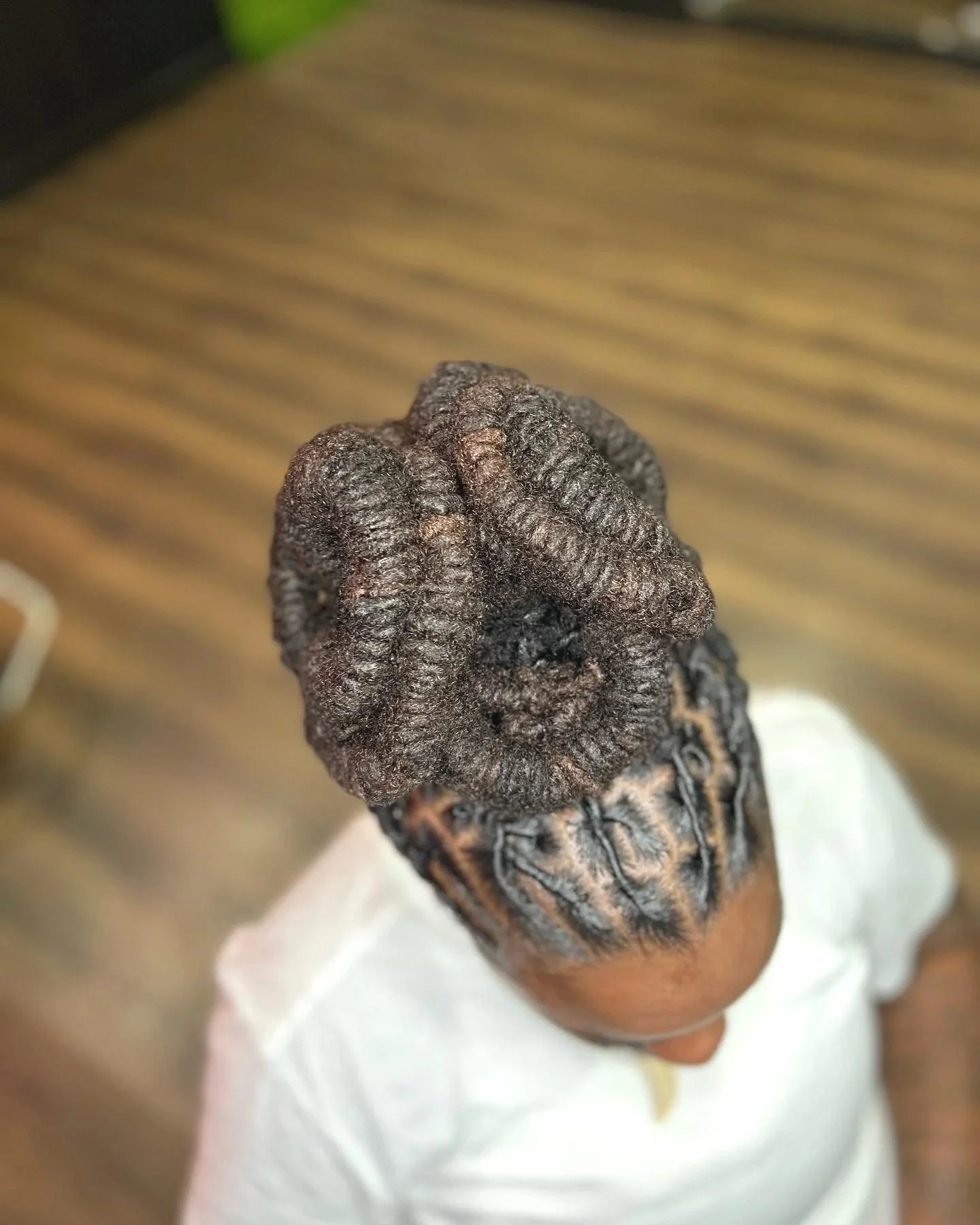 FISHBONE CROWN UPDO PROTECTIVE STYLE WITH PRECISE PARTING AND SCULPTED FINISH STYLED BY PROFESSIONAL LOCTICIAN L9 LOCS BY KEKELOCSBYKEKE