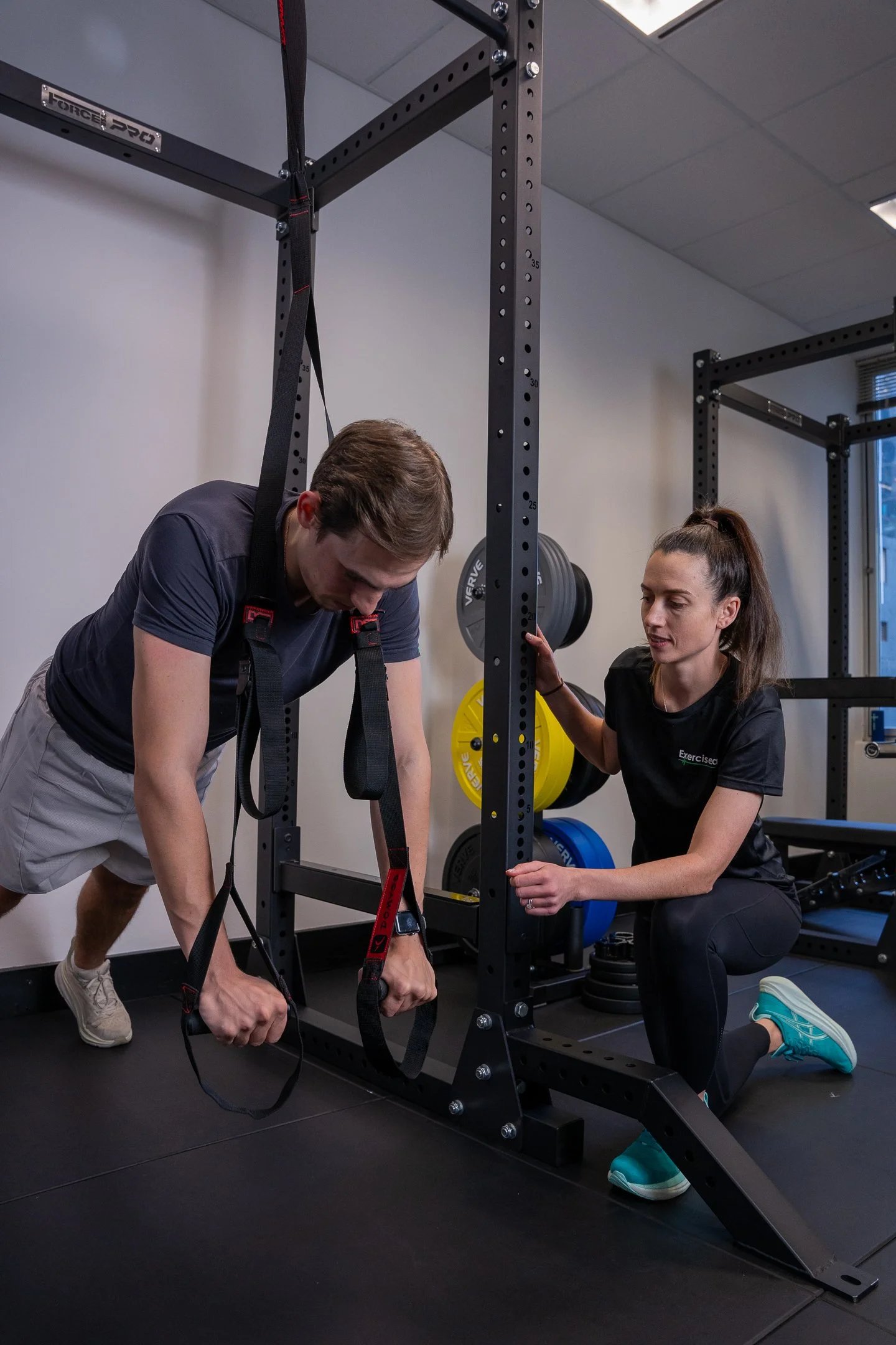 exercise-physiologist-supervising-trx-training-sydney.jpg