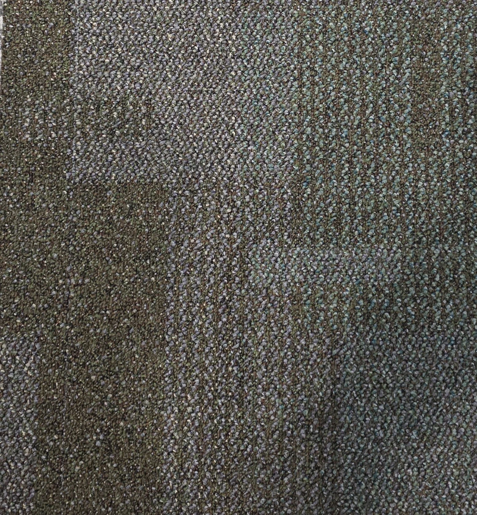 Close-up of a textured surface with many small bumps and dots.
