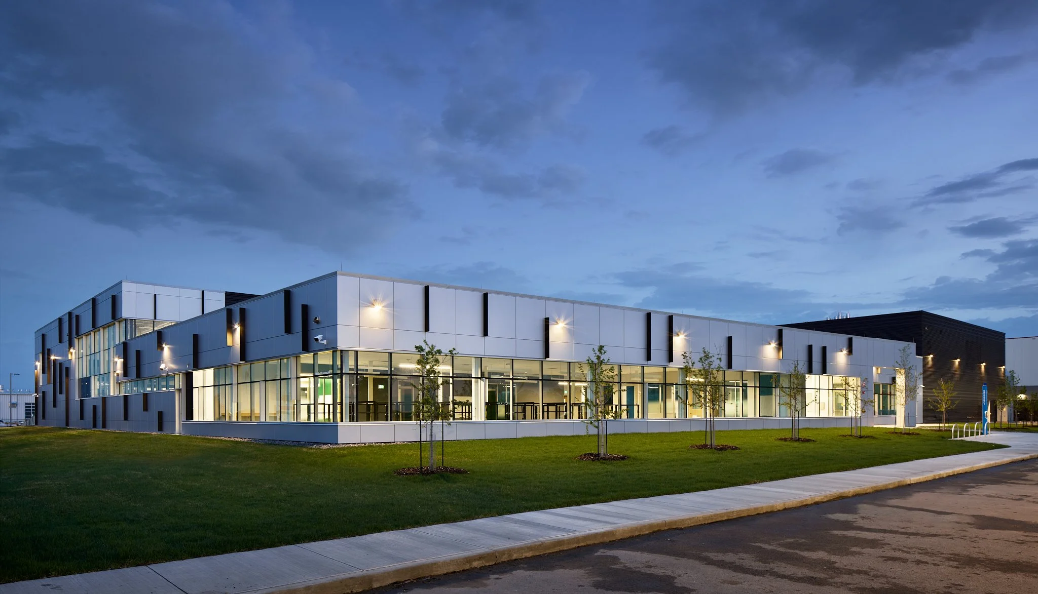 Edmonton Drug facility plant exterior night shot showcasing building design and lighting
