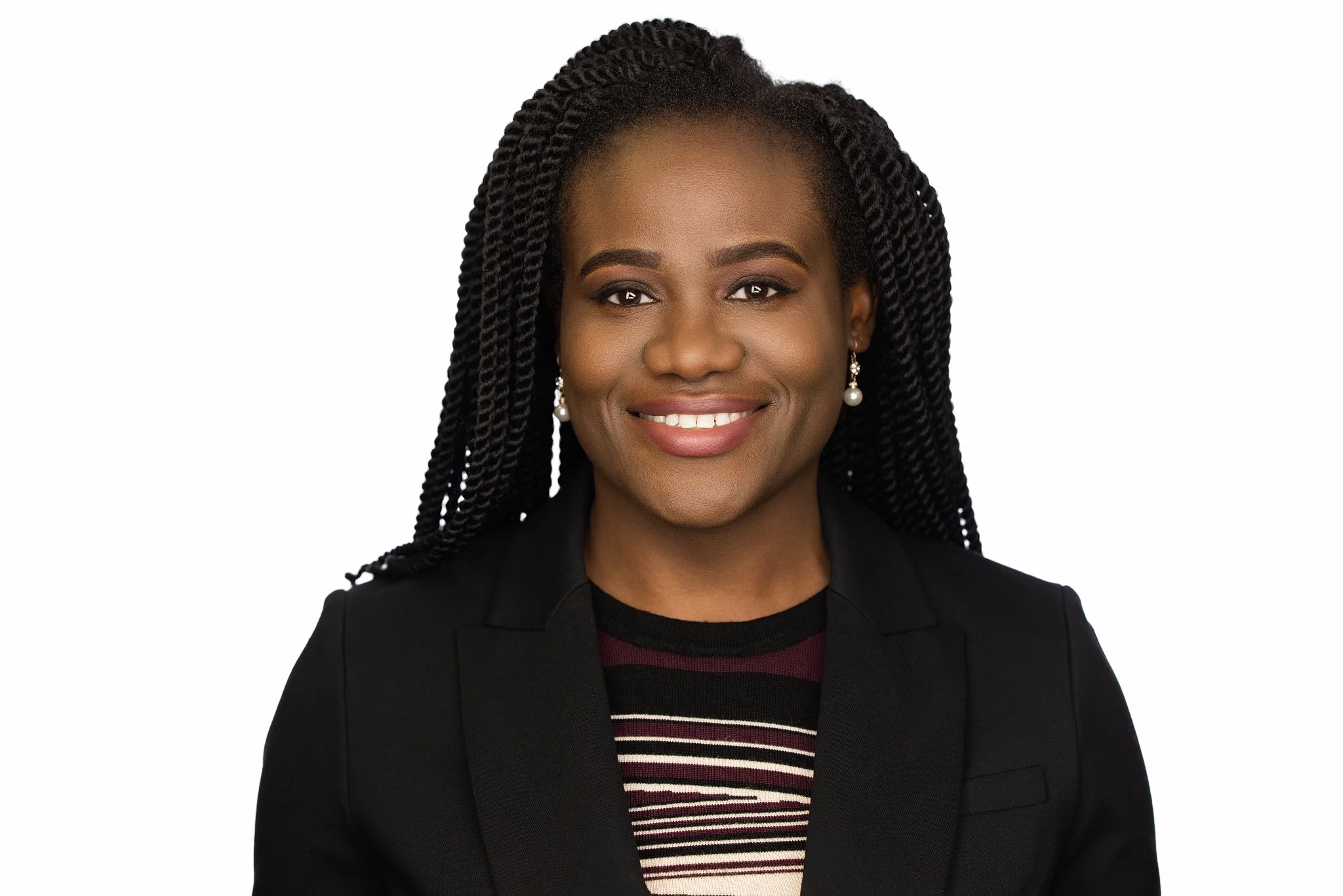 Corporate headshot black woman with braided hair close up on white background