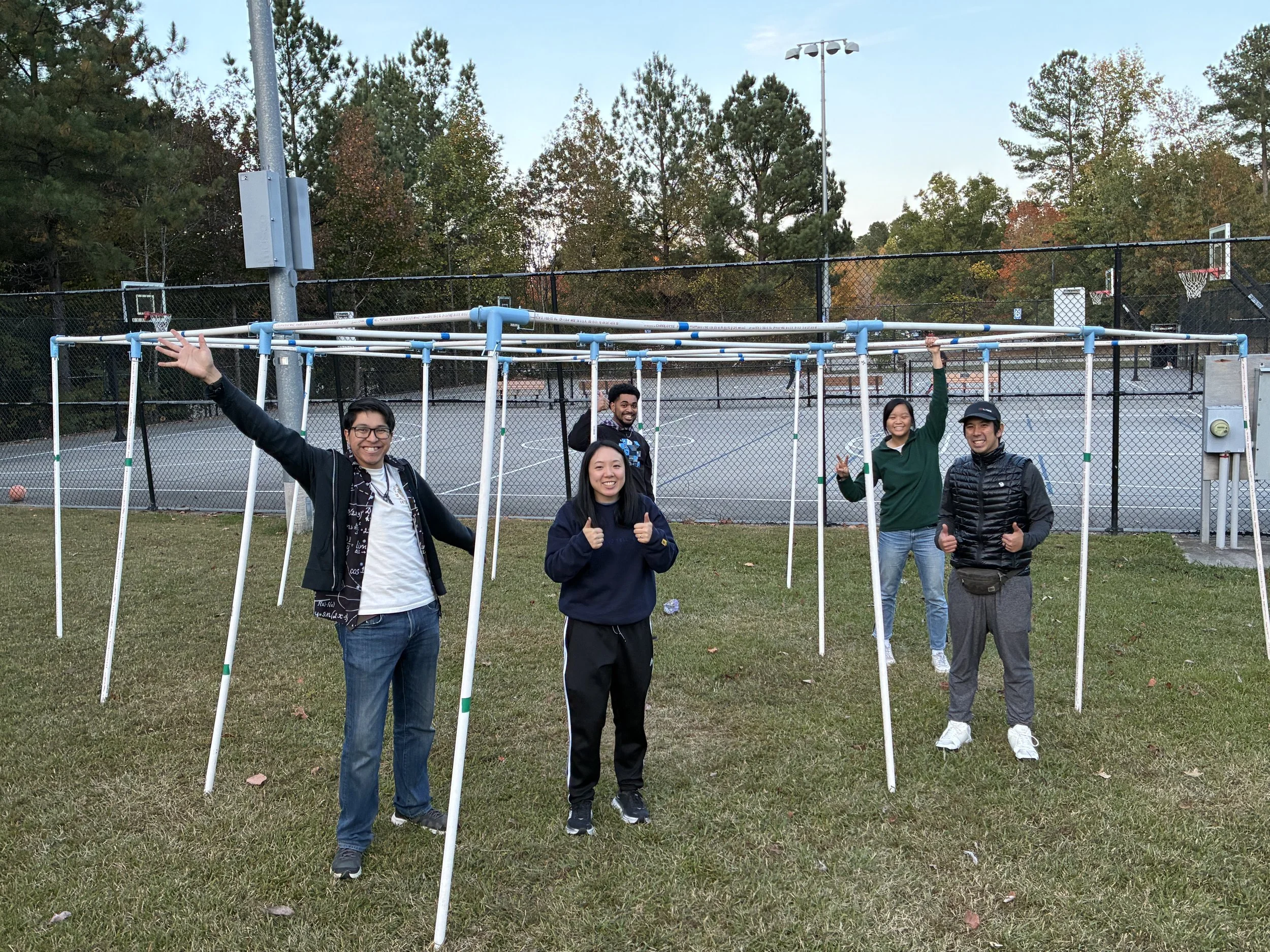 Mentors setting up 9 square for Youth Group!