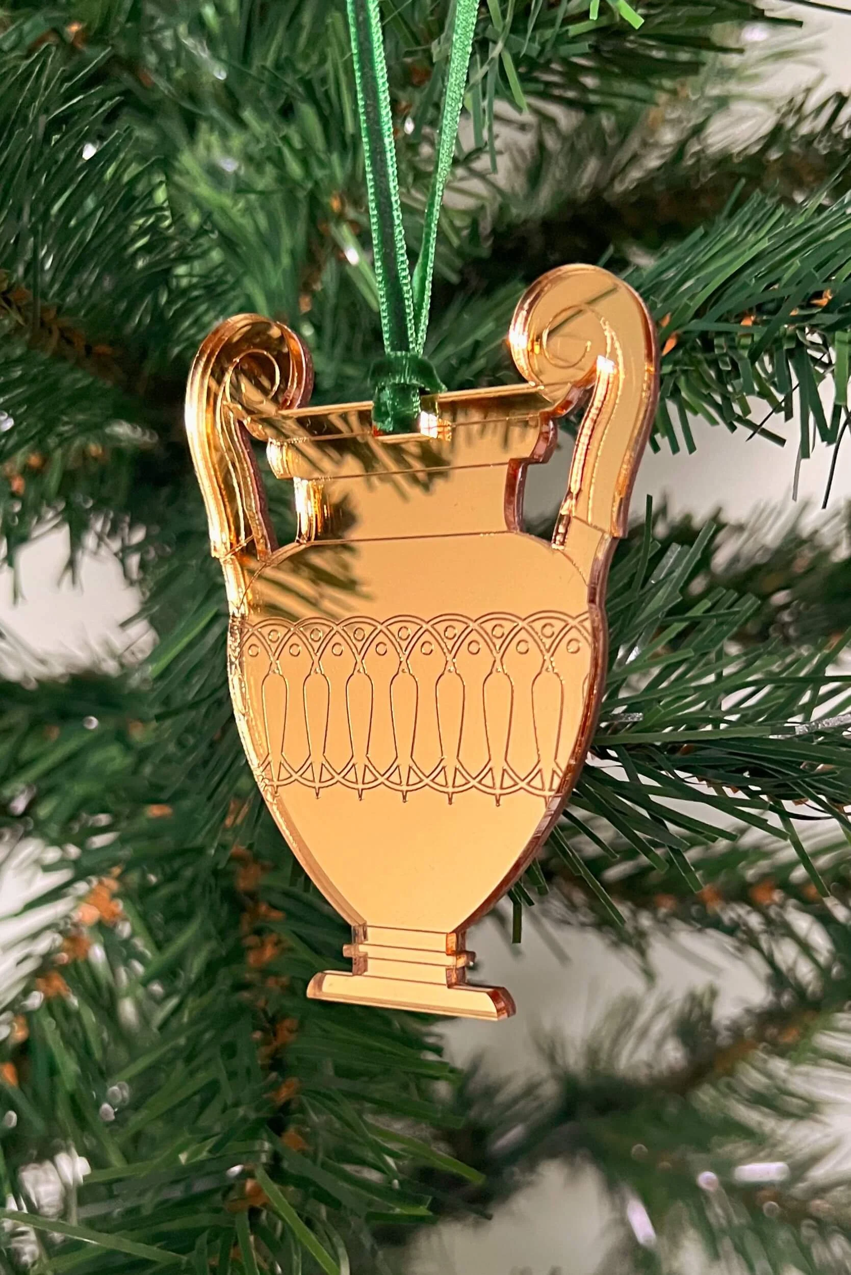 ancient greek krater christmas tree ornament in gold mirror acrylic hanging from a christmas tree
