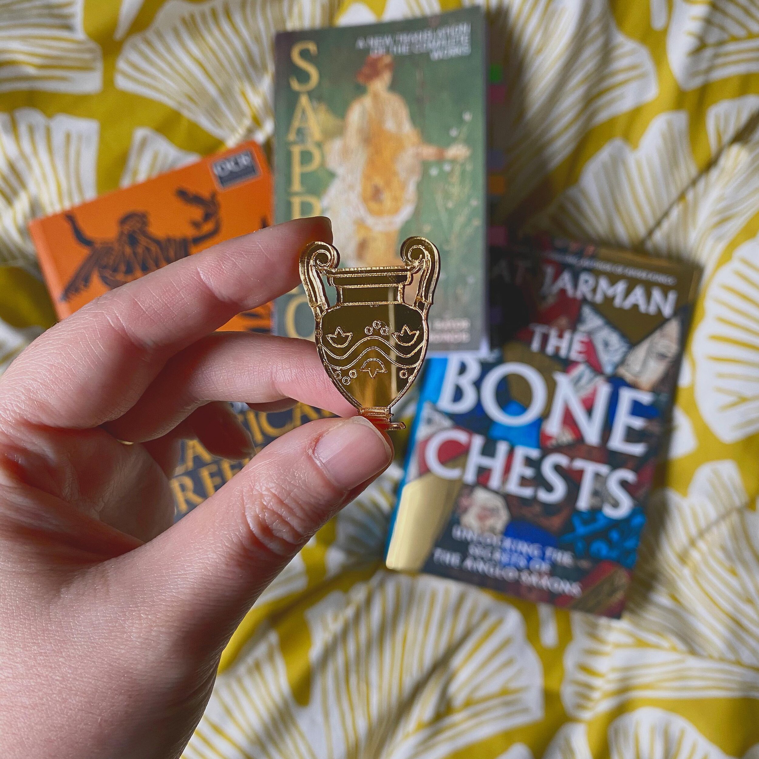 this march i&rsquo;ve been:
🤧 getting over an awful cold
🏺 wearing my new krater brooch!
💖 reading sappho for @ancientworldbc 
🦴 discovering anglo-saxon england w/ the bone chests
📖 translating herodotus 
📺 bingeing physical 100 s2