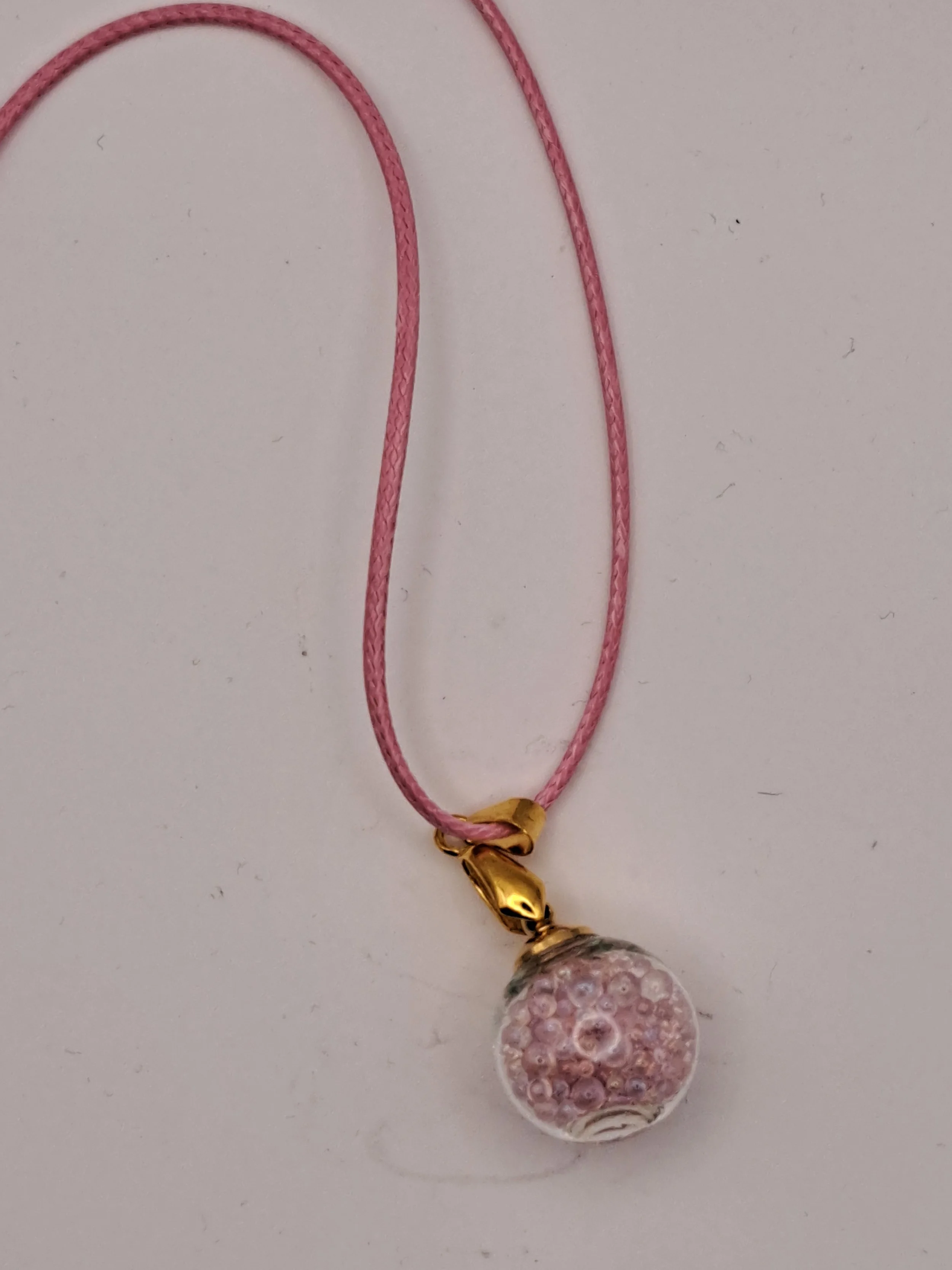 Pink ball pendant with necklace