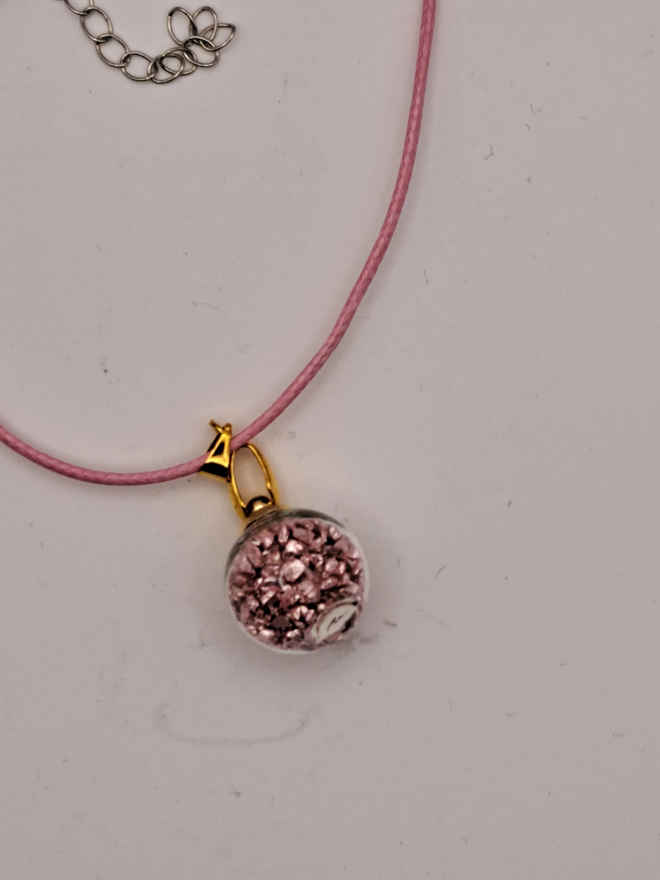 Dark pink ball pendant with necklace