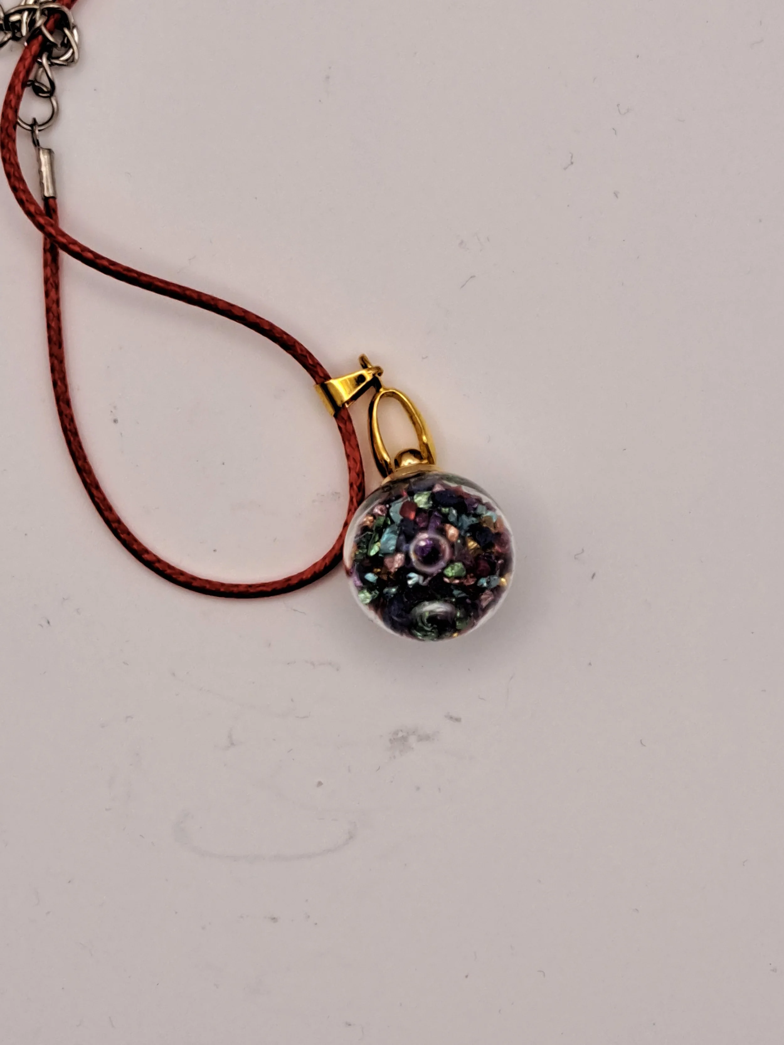 Multi coloured ball pendant with necklace