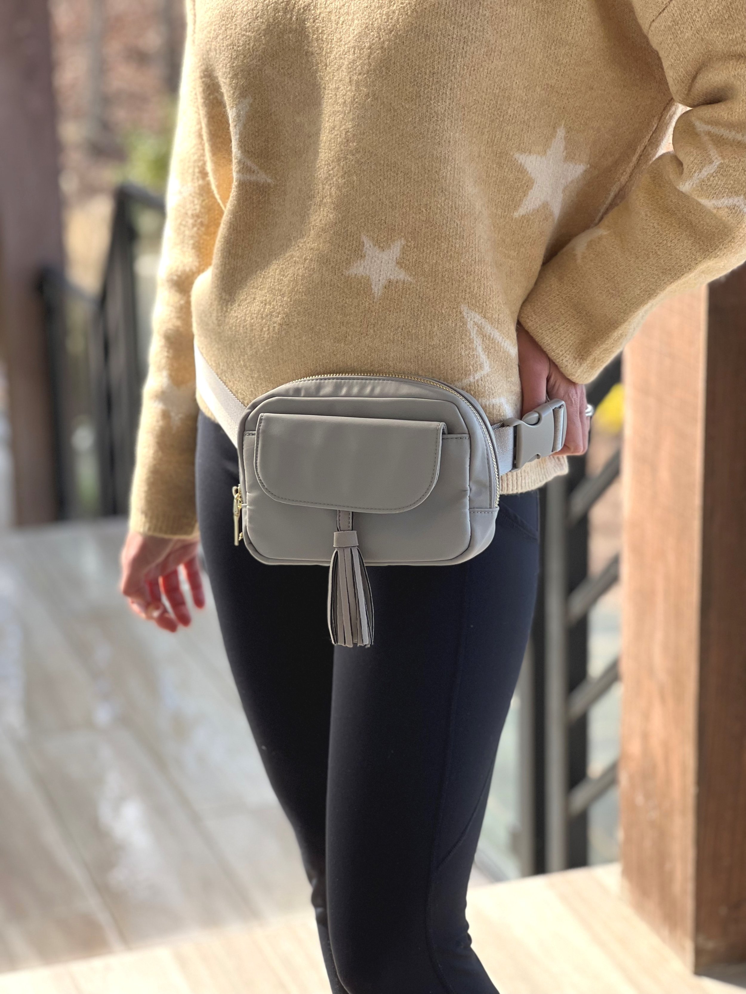 waist+bag+model+with+grey+tassel.jpg