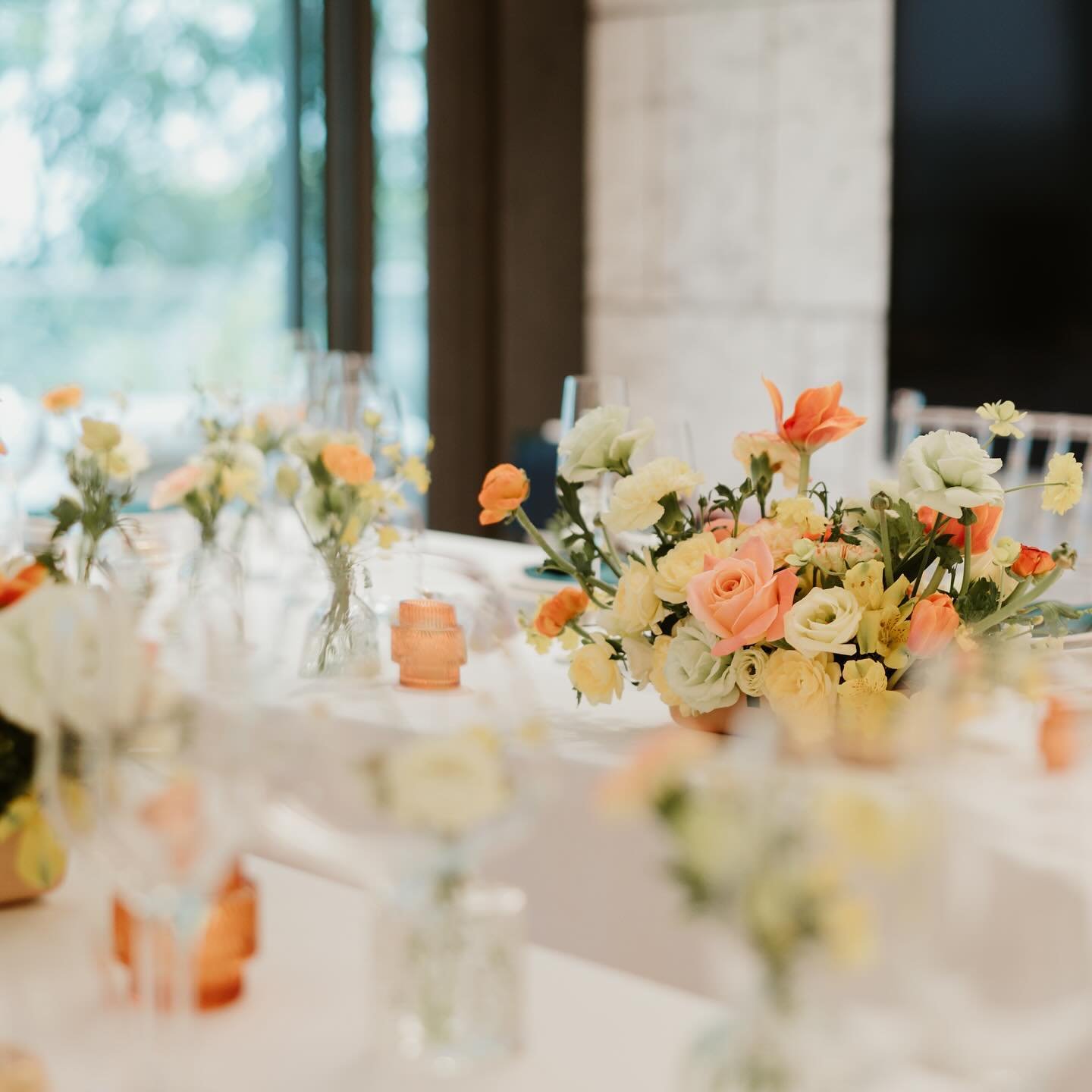 Our table styling for a wedding solemnisation at a private residence - featuring exquisite arrangements of vibrant yellow and orange florals that were thoughtfully curated. 

Let our dedicated team bring your dream wedding to life with our bespoke ta