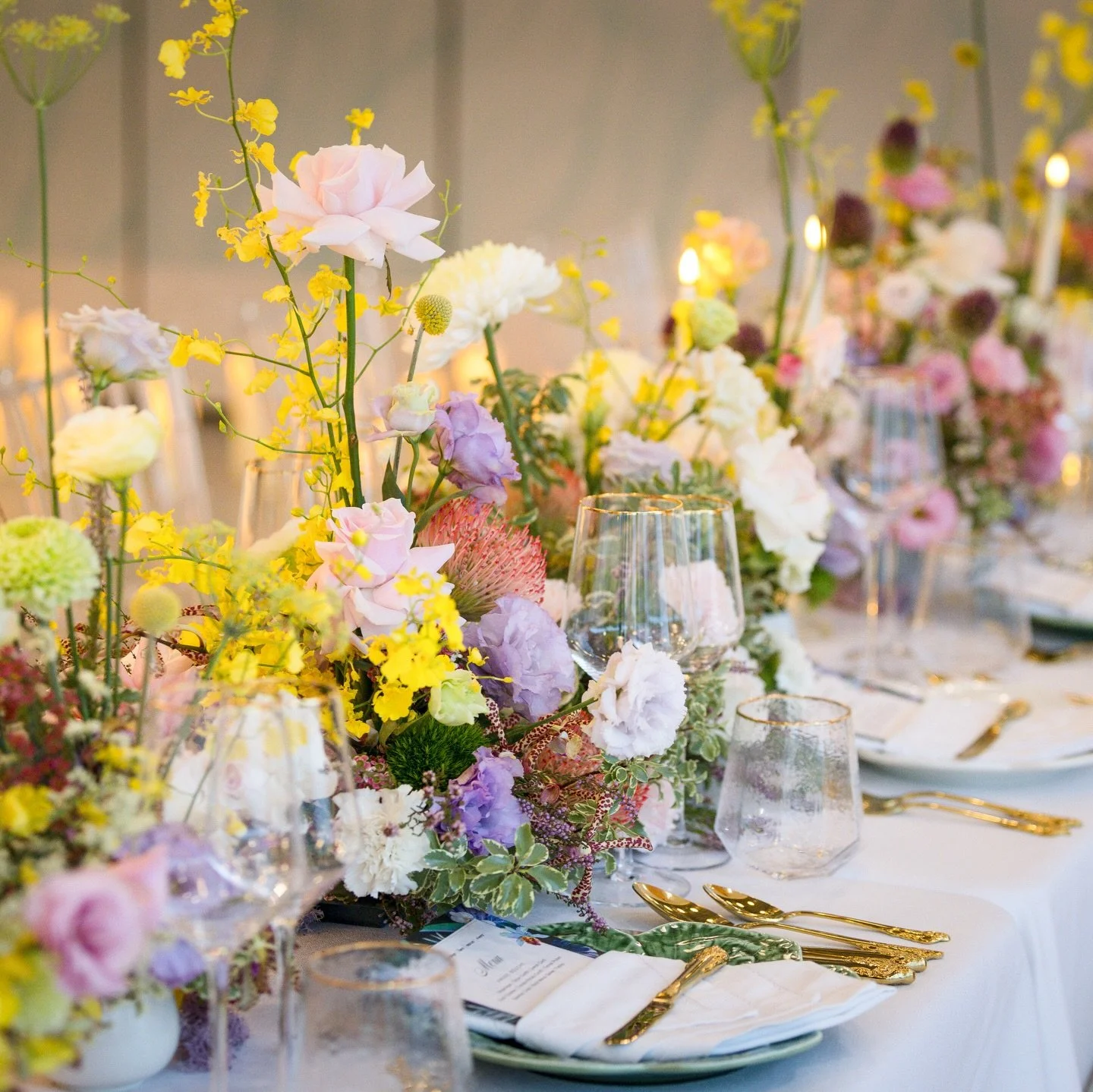 Table styling with a difference.
An immersive dining experience where design meets discovery.

What appears to be a floral fantasy holds a hidden surprise beneath &mdash; a delicate amuse-bouche tucked under the blooms, crafted to spark curiosity and
