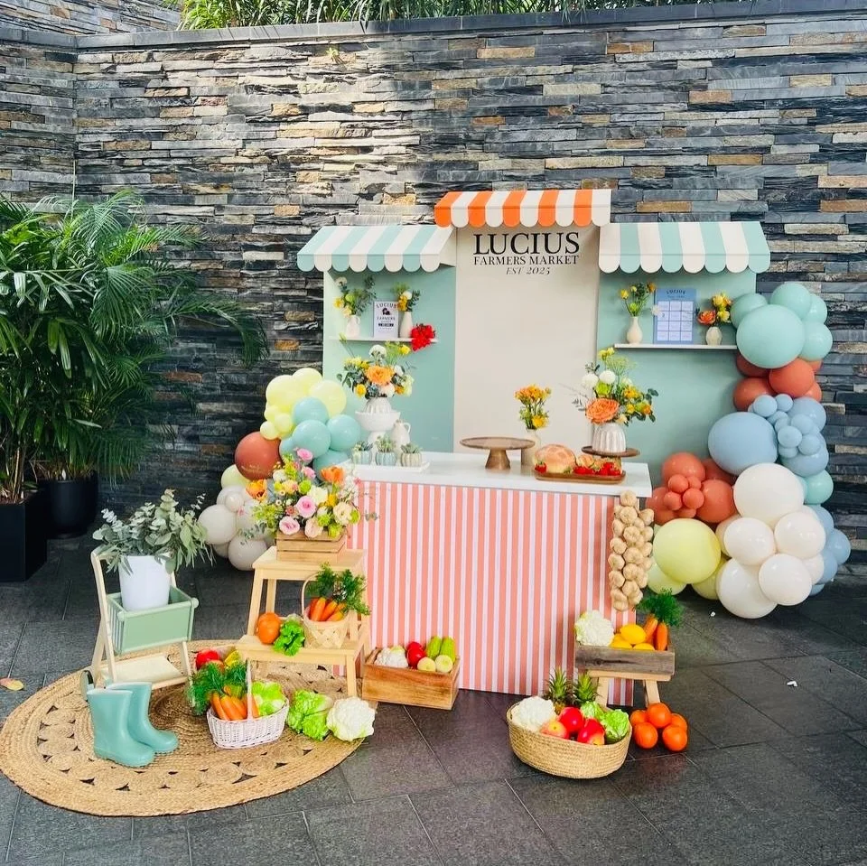 Designed to play, Made to reimagine.

A fresh little corner where charm meets creativity.
This farmer&rsquo;s market-inspired setup was all about playful details designed to spark joy for guests of all ages.

This also features a separate and bespoke