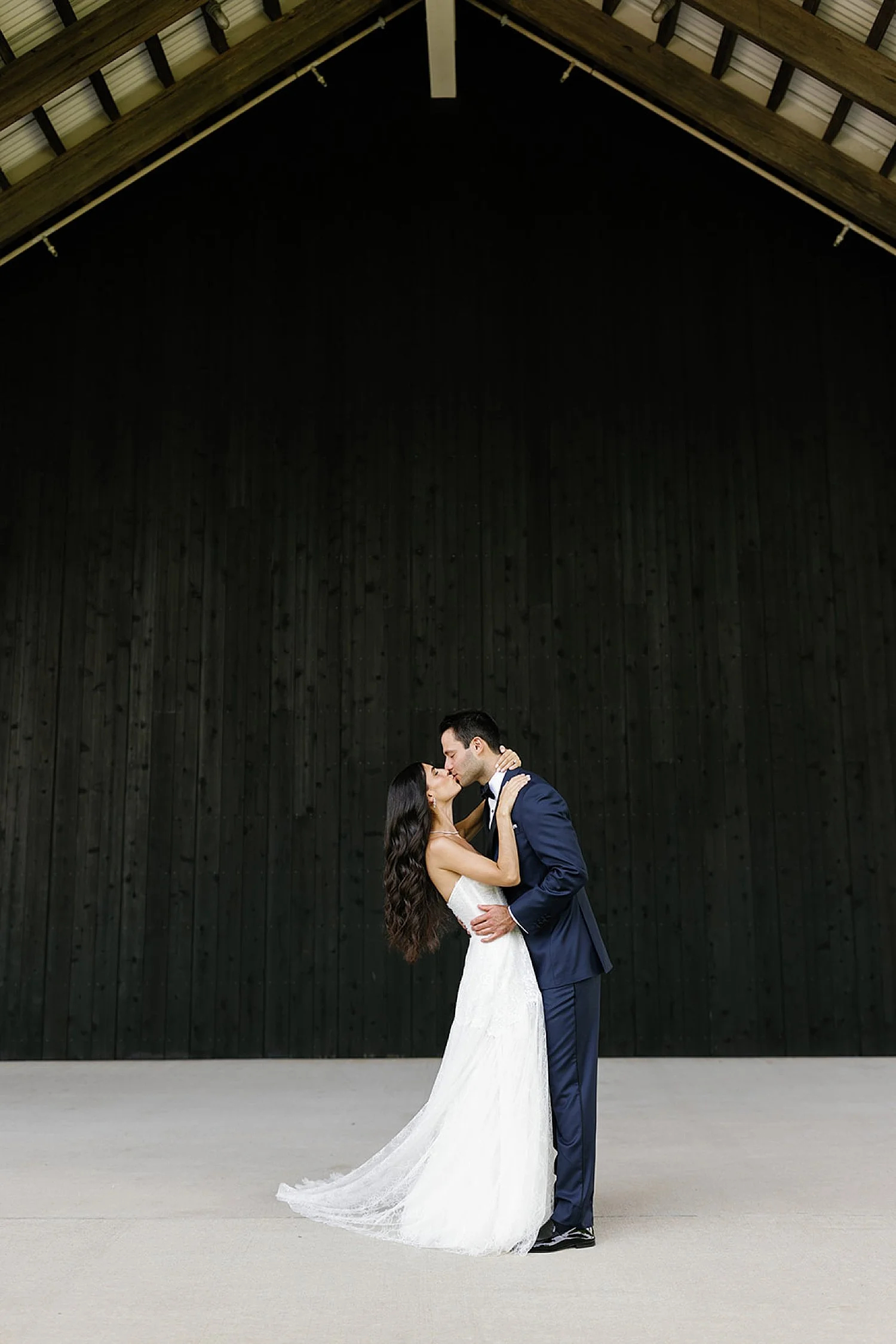  bride and groom kiss  