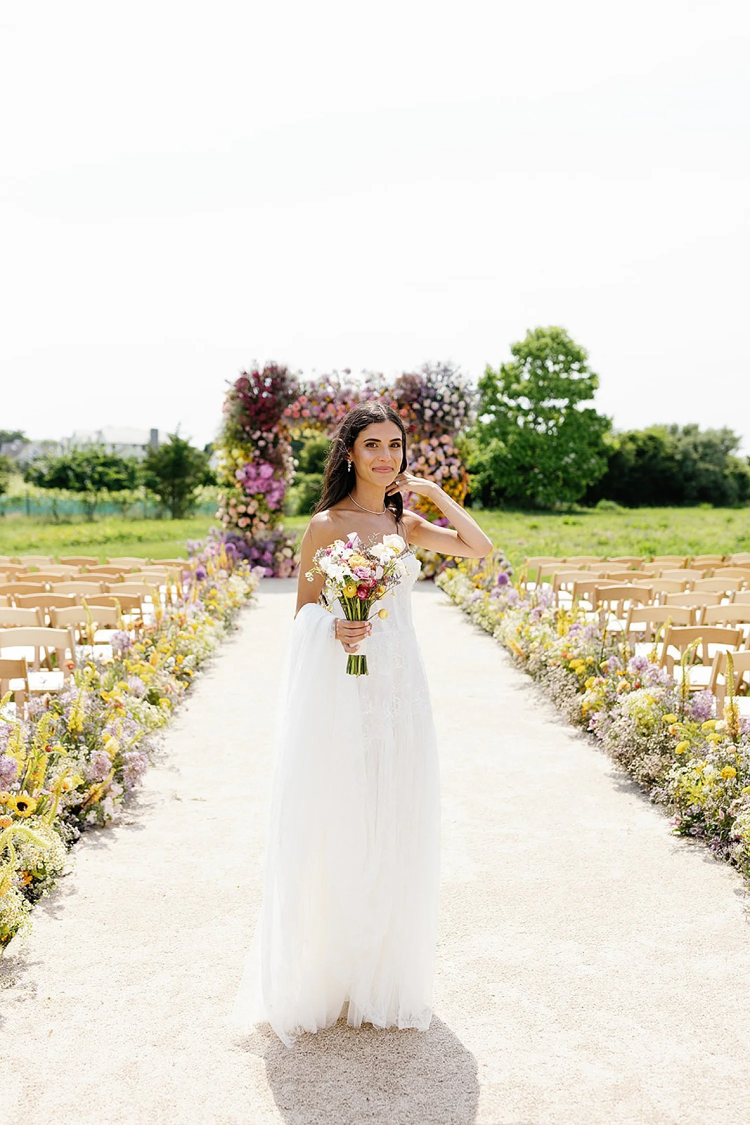  bridal portraits at wedding ceremony setup at Parrish Art Museum   