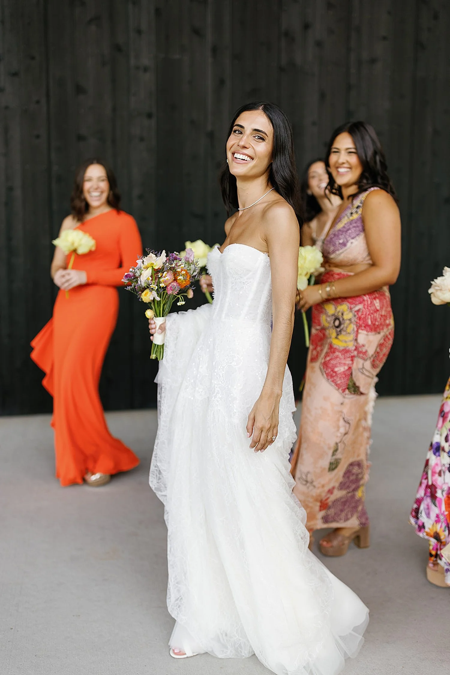  bride with bridesmaids in colorful summer dresses for Parrish Art Museum Wedding 