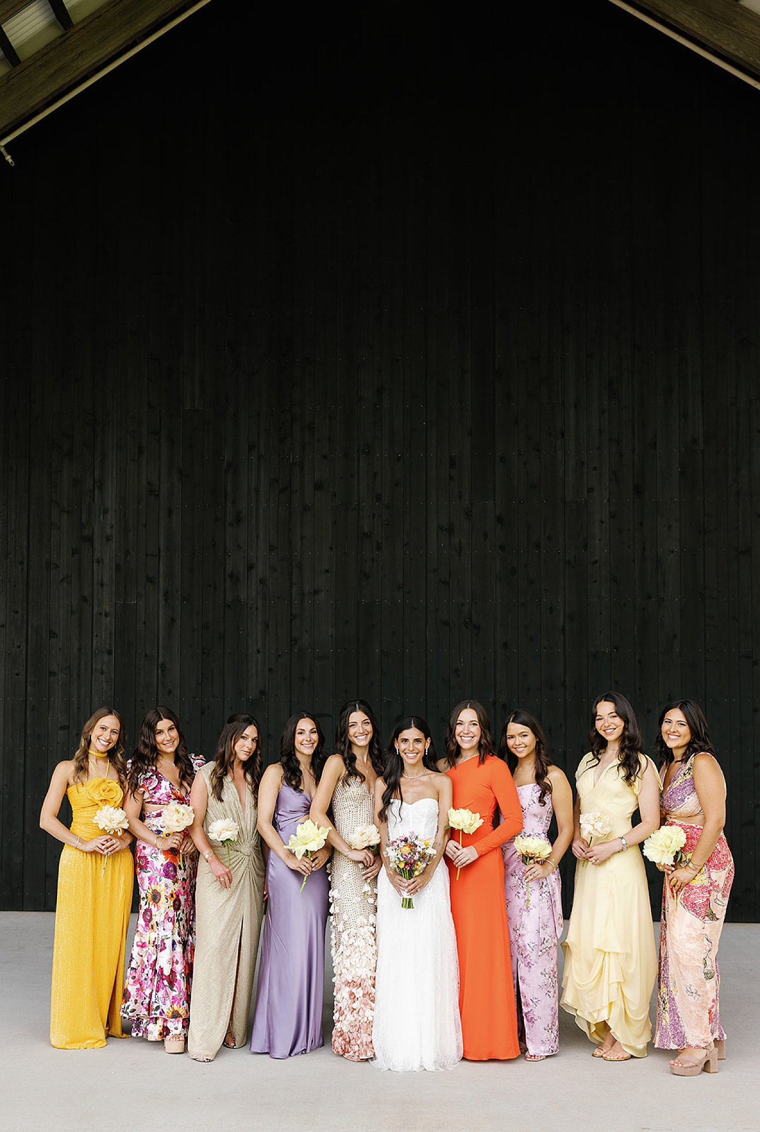  bridesmaids in colorful bridesmaids dresses for summer wedding in the Hamptons 
