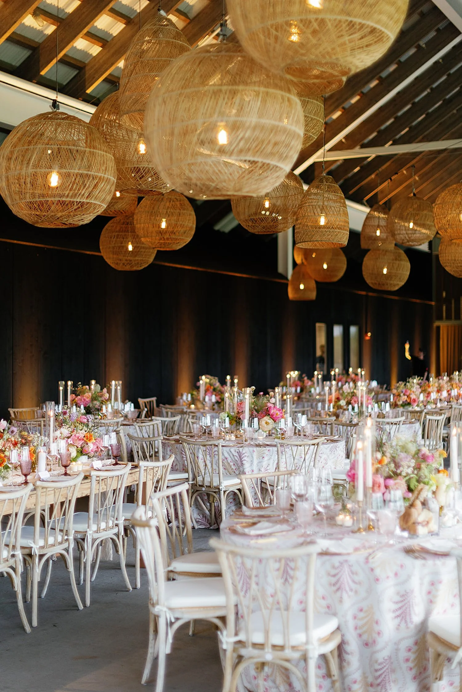  soft lighting and stunning florals decorate  Parrish Art Museum wedding reception  