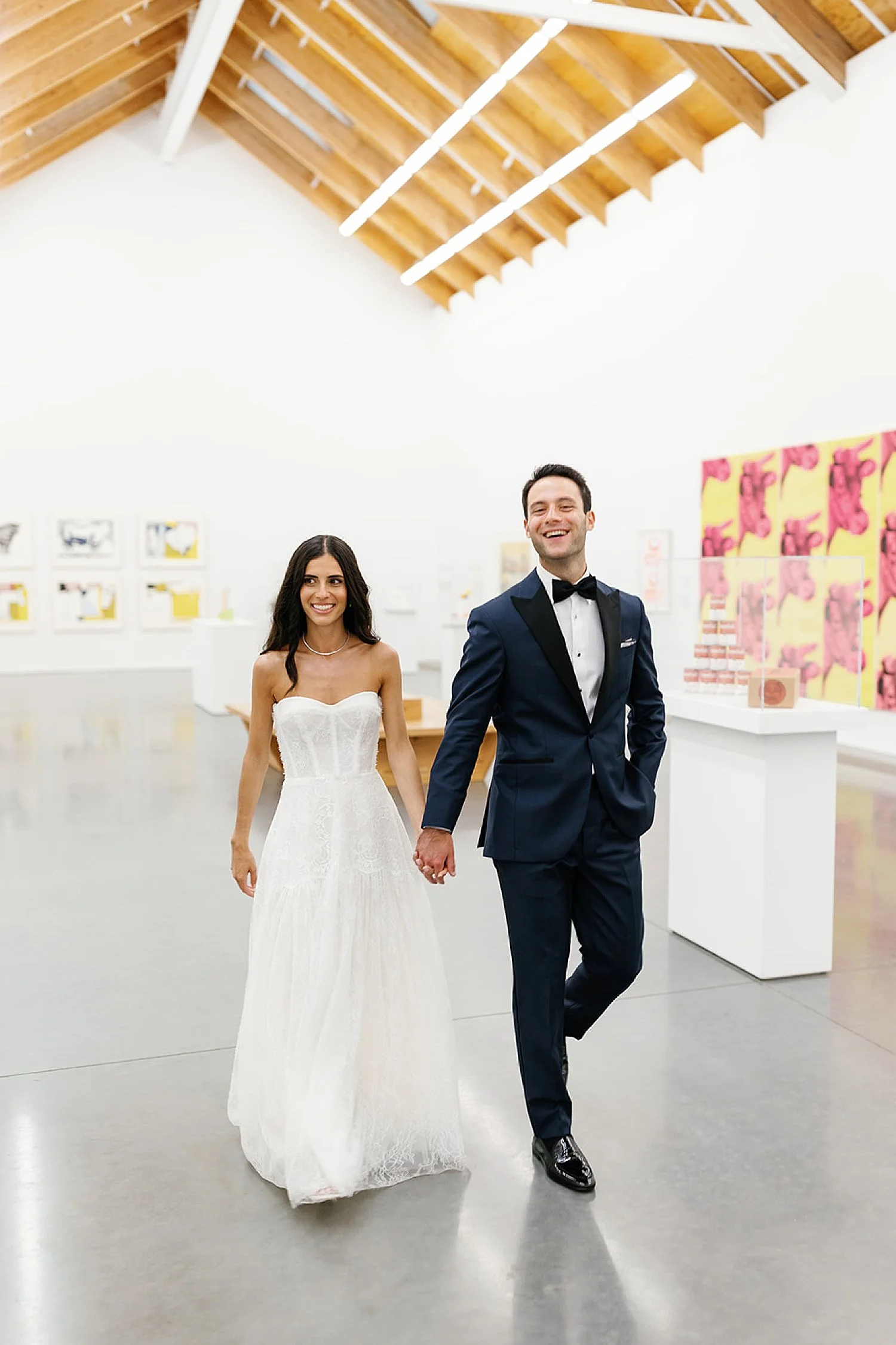  Newlyweds walk through the  Parrish Art Museum in the Hamtons 