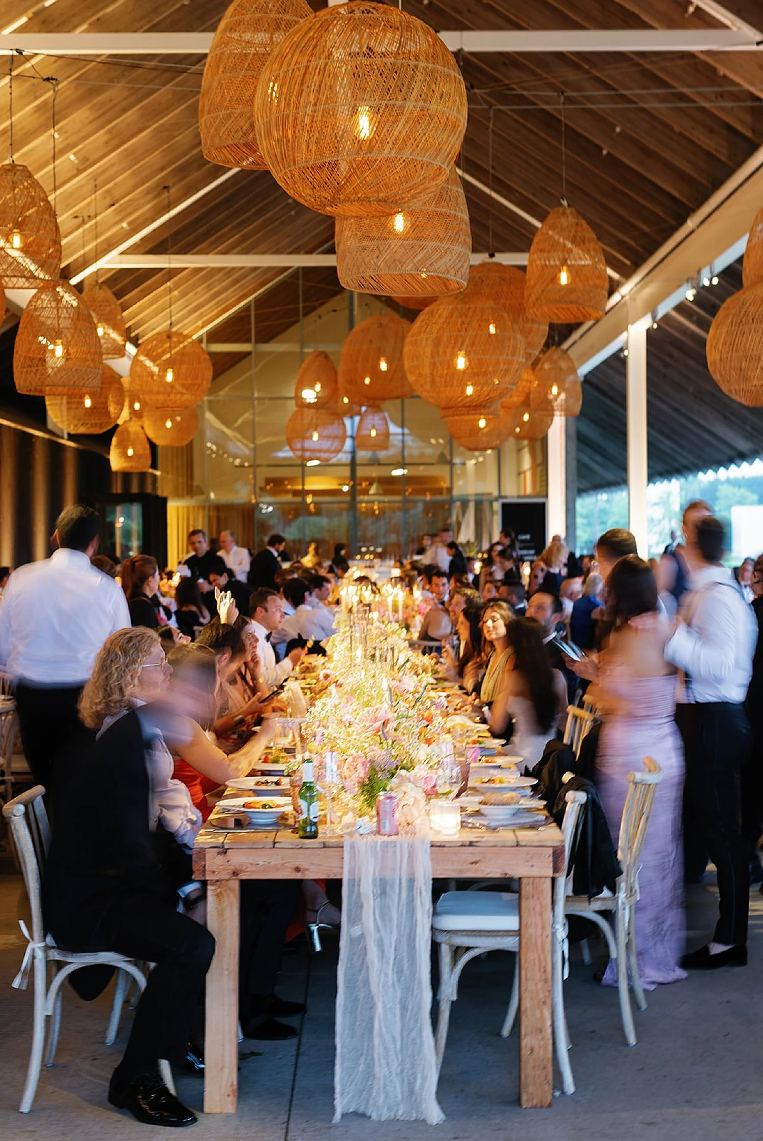  guests gather for dinner at Luxury summer wedding in the Hamptons at Parrish Art Museum  