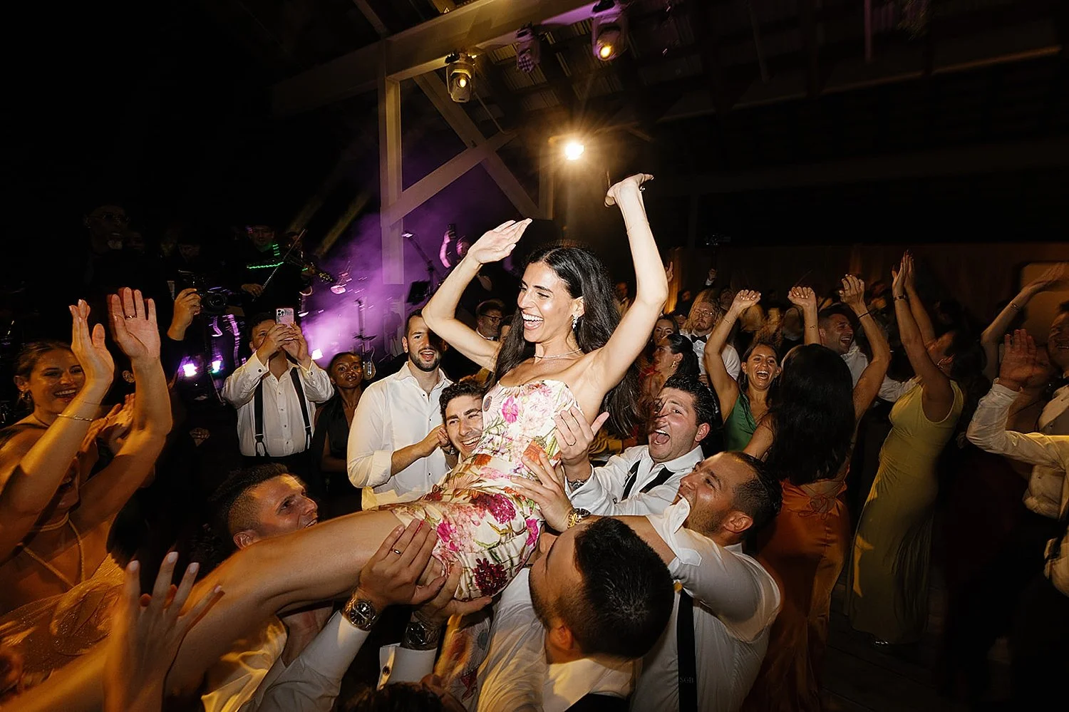  bride lifted up in the air  