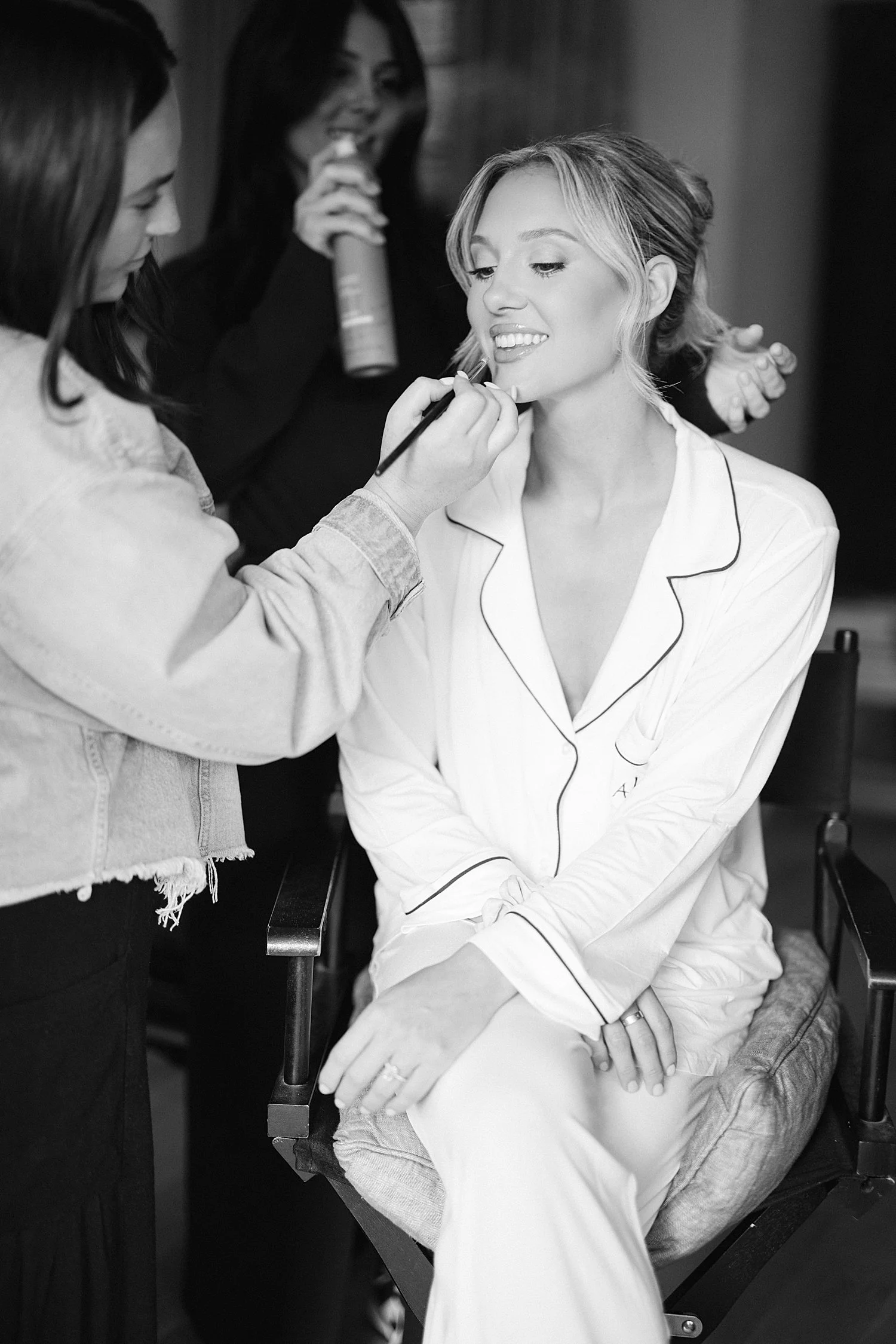  bride getting her makeup done  