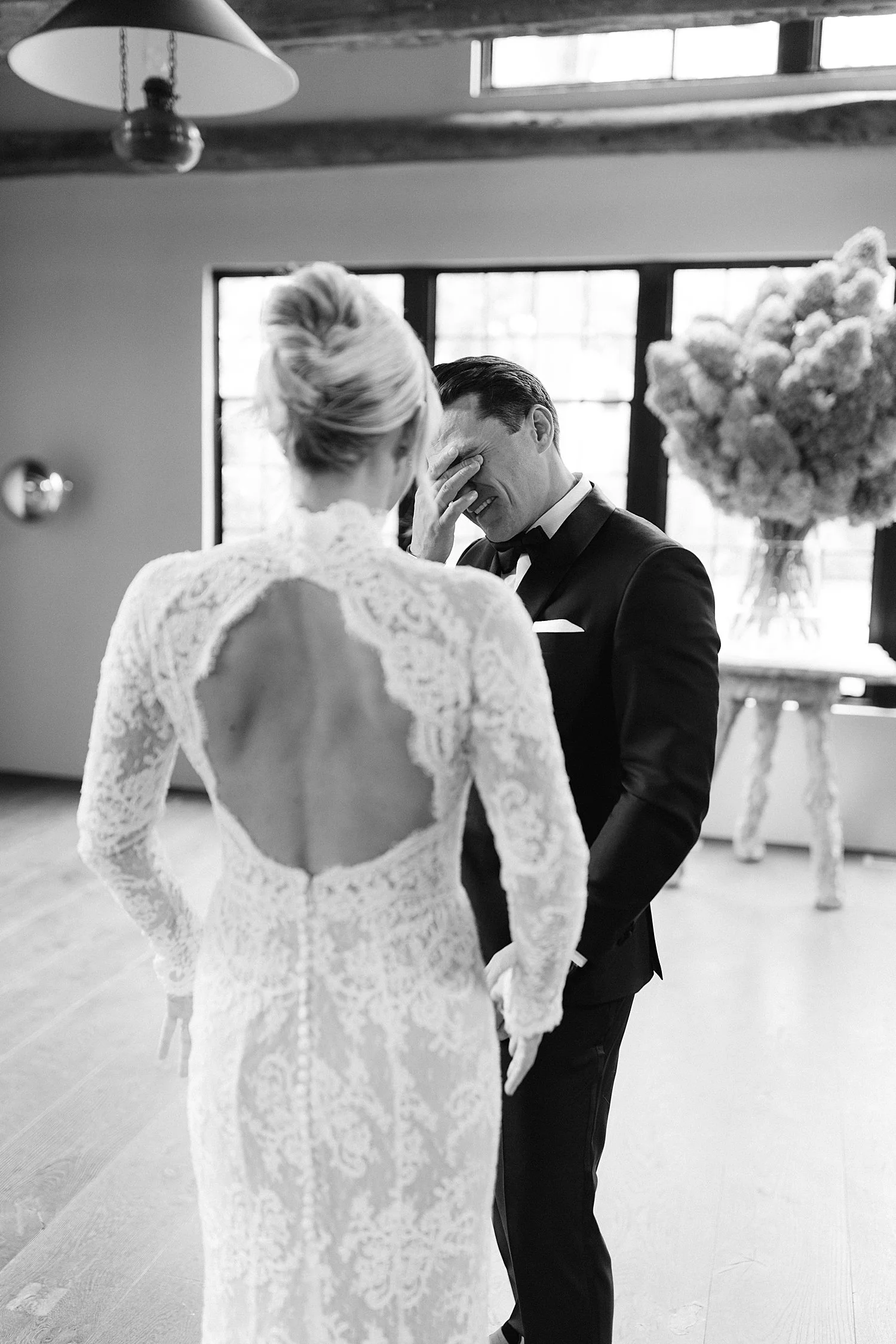  emotional groom during first look 