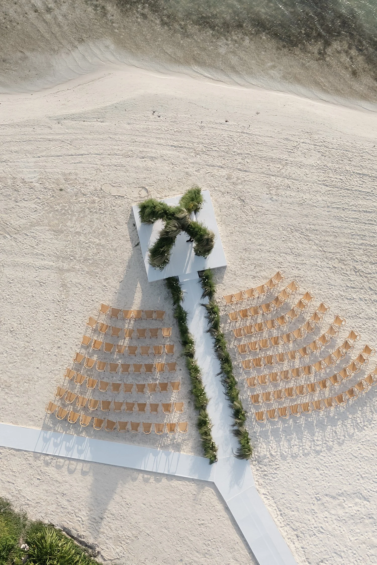  aerial view of wedding ceremony on the beach at NIZUC Resort in Mexico 