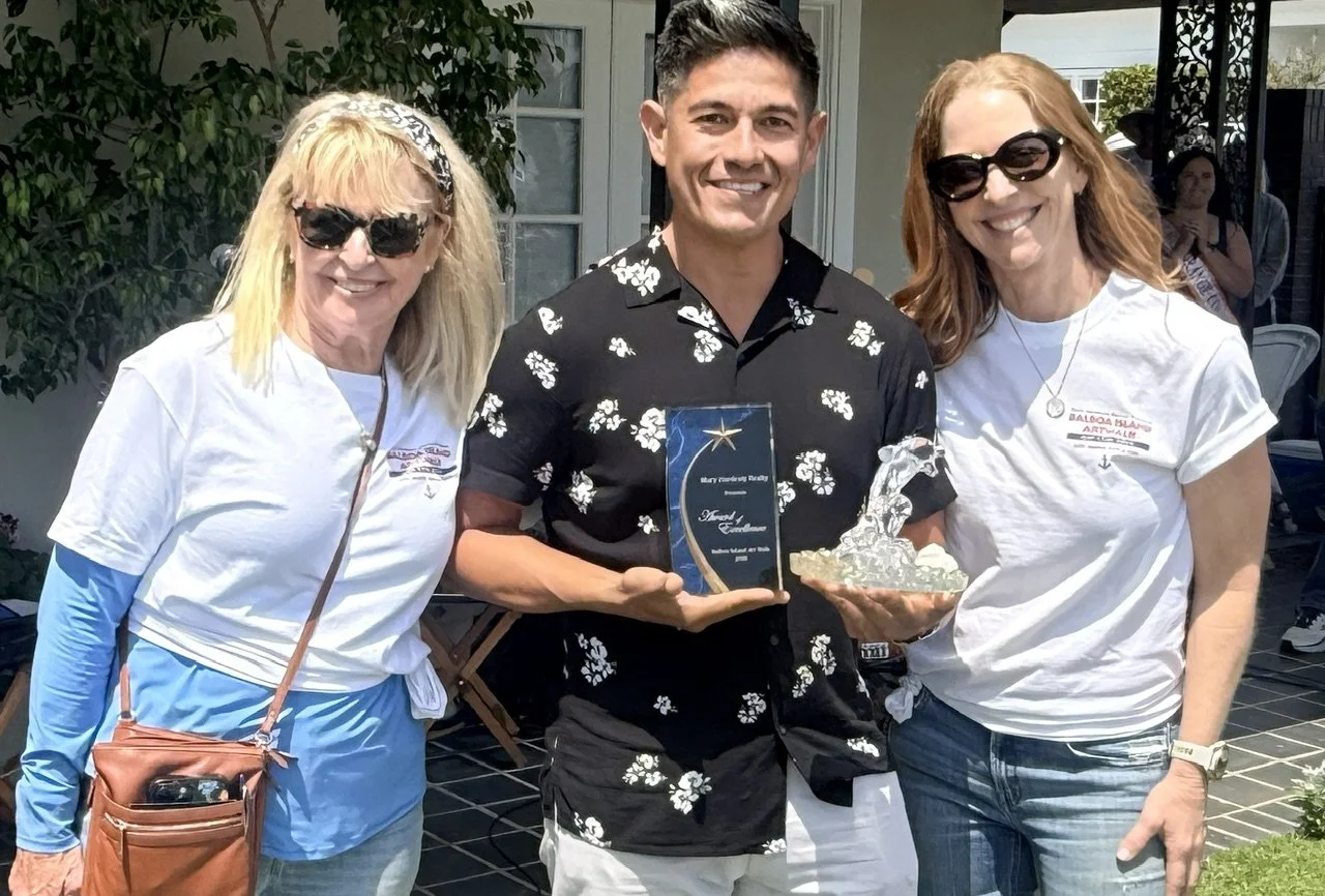 Jose Antonio Covarrubias (center) - Mary Hardesty Realty Award of Excellence