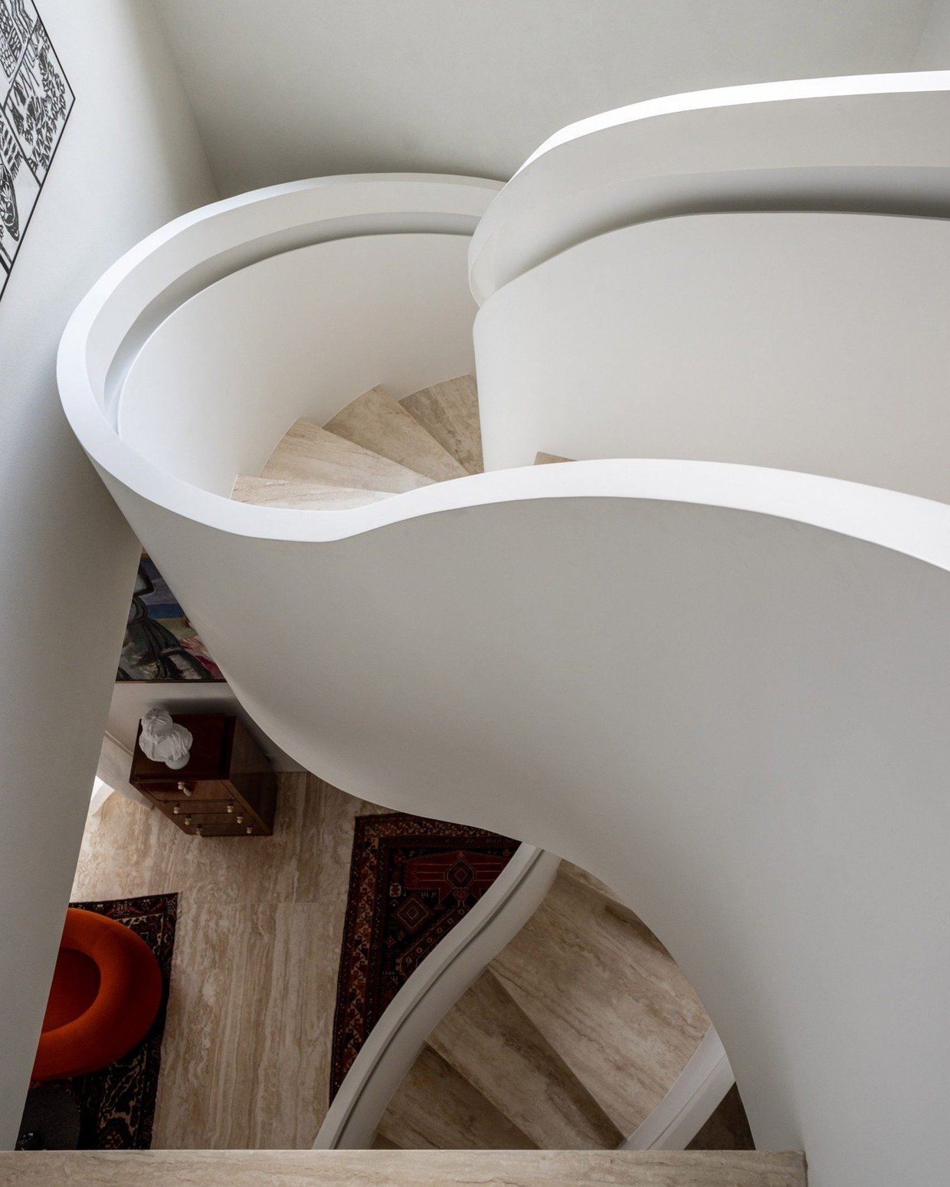 &quot;... A sculptural staircase snakes between the levels of the duplex apartment. The renovation of this 960-square-metre Frederic Chopin Apartment was led by architect Marina Cardoso de Almeida of @triaarquitetura, who reconfigured the layout to m
