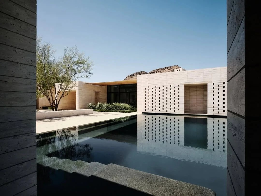 // Stone Court Villa //

"This body of water, with a negative edge to the desert, hides a deep swimming pool and the lower pool terrace beyond, thus the impression one has is of a large abstract plane of water reflecting only sky and desert beyo