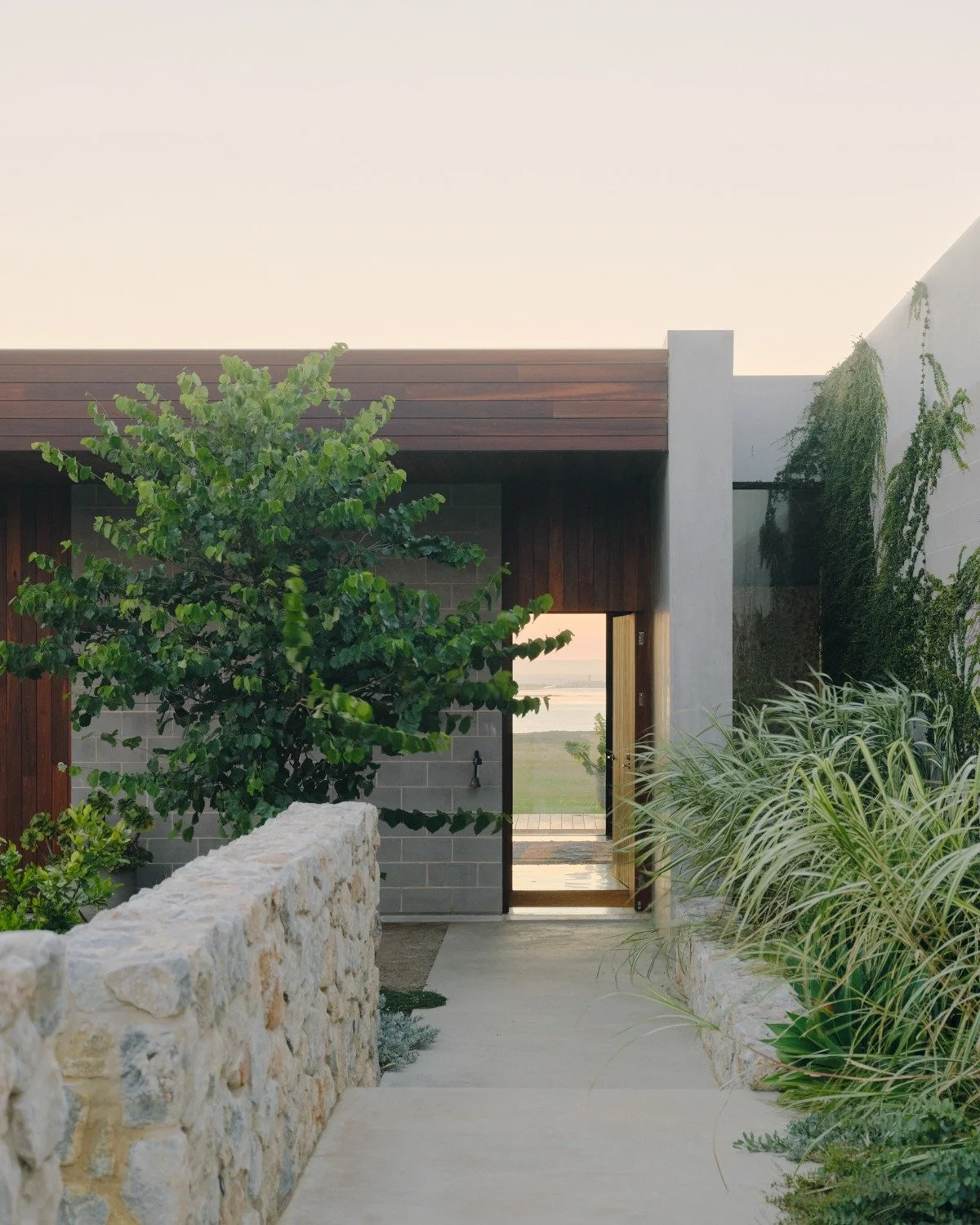 // Mannerim House // 

"Externally, the structure appears modest, composed of blockwork selected for durability and thermal performance. Internally, the atmosphere shifts to one of warmth and tactility. Timber wraps around the interior spaces, c
