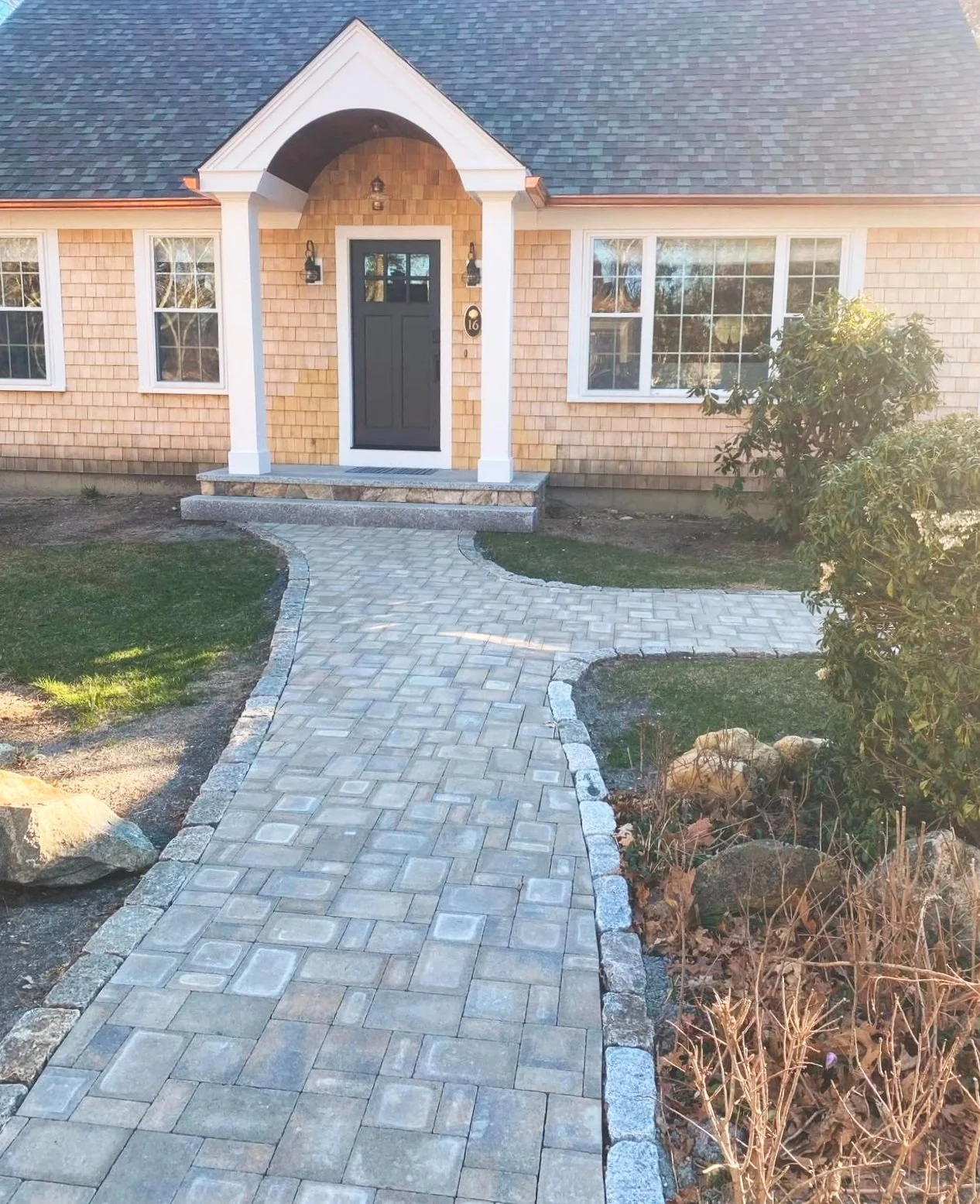 Renovation with upgraded front entry, hardscape, barrel vault, and more.