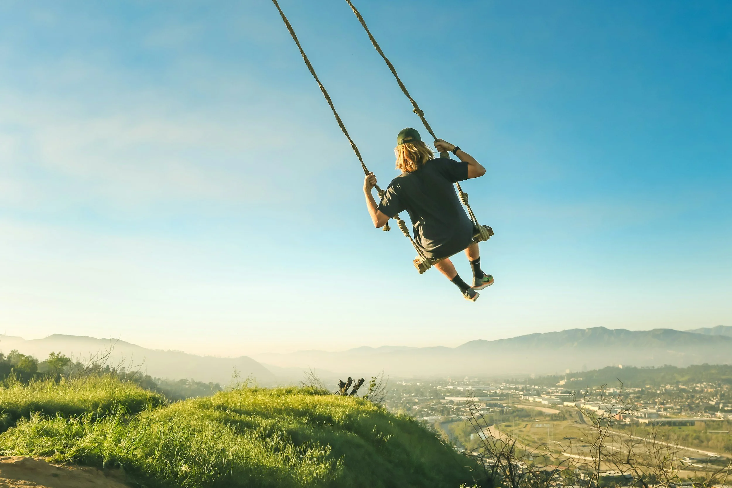 Always “On”: The Emotional Weight of Living in Constant Alertness;girl in a swing