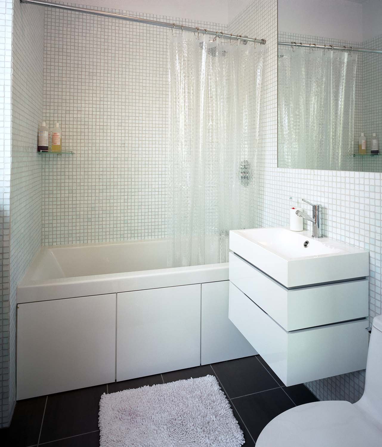 ….and the bathroom, neutral palettes were used to please unknown potential buyers of this spec project.