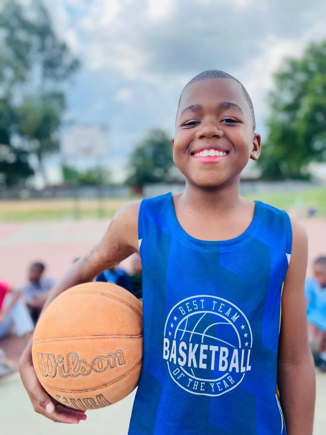His smile says it all! #selfesteem #hoops4hope #childrensrights