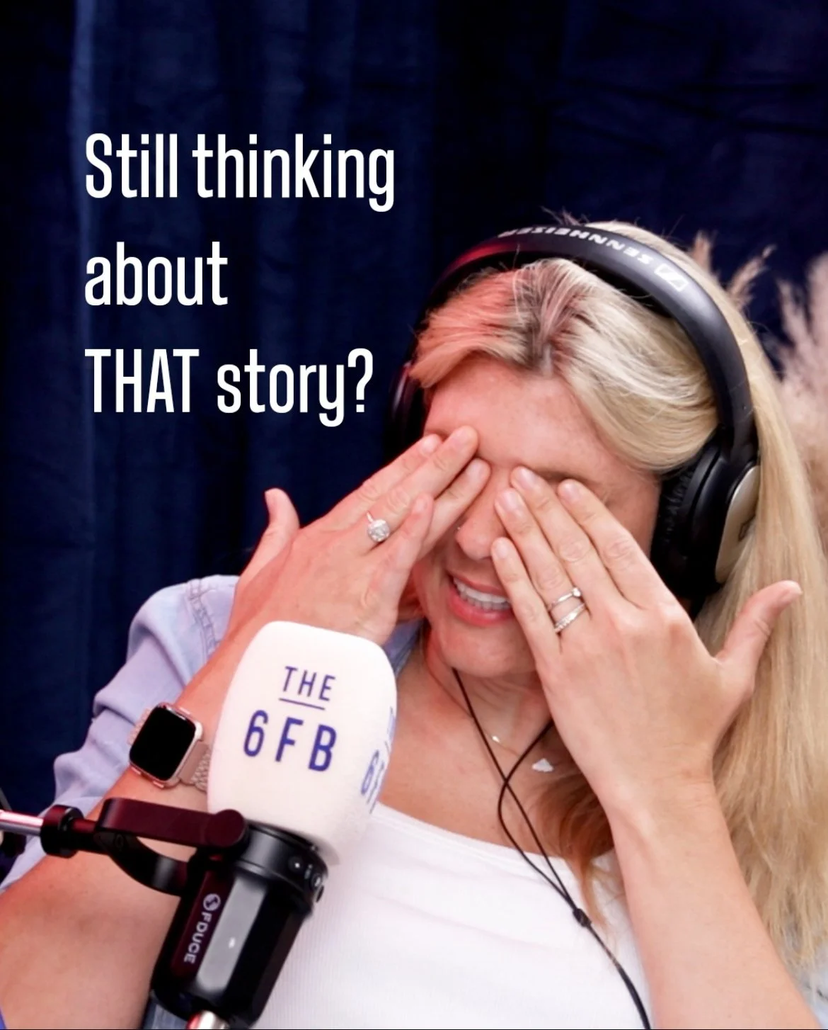 A woman wearing headphones sits in front of a microphone labeled 'The 6FB', smiling and covering her eyes with her hands. The text on the image reads: 'Still thinking about THAT story?'