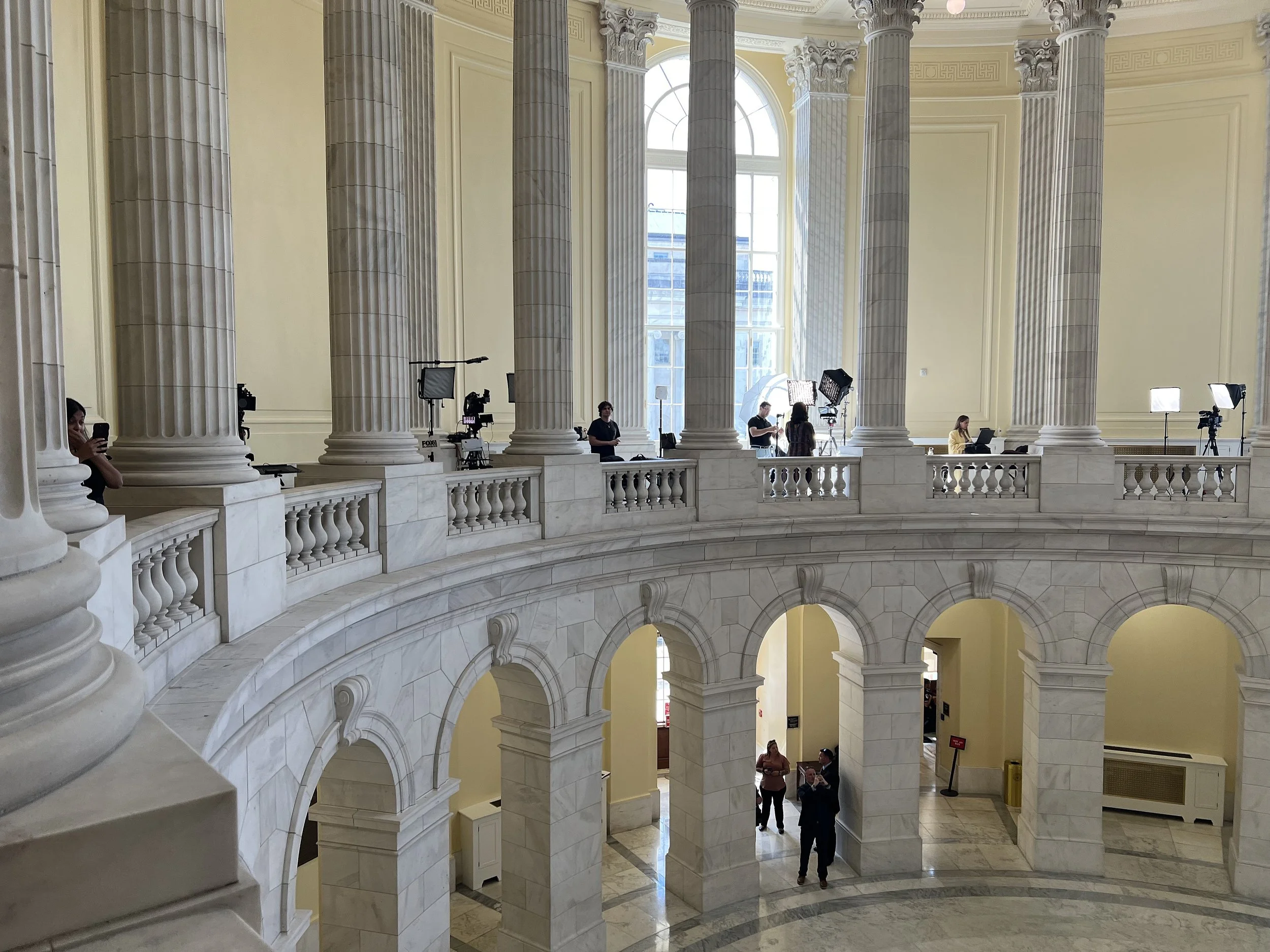 Media waiting to interview House members in the Cannon building