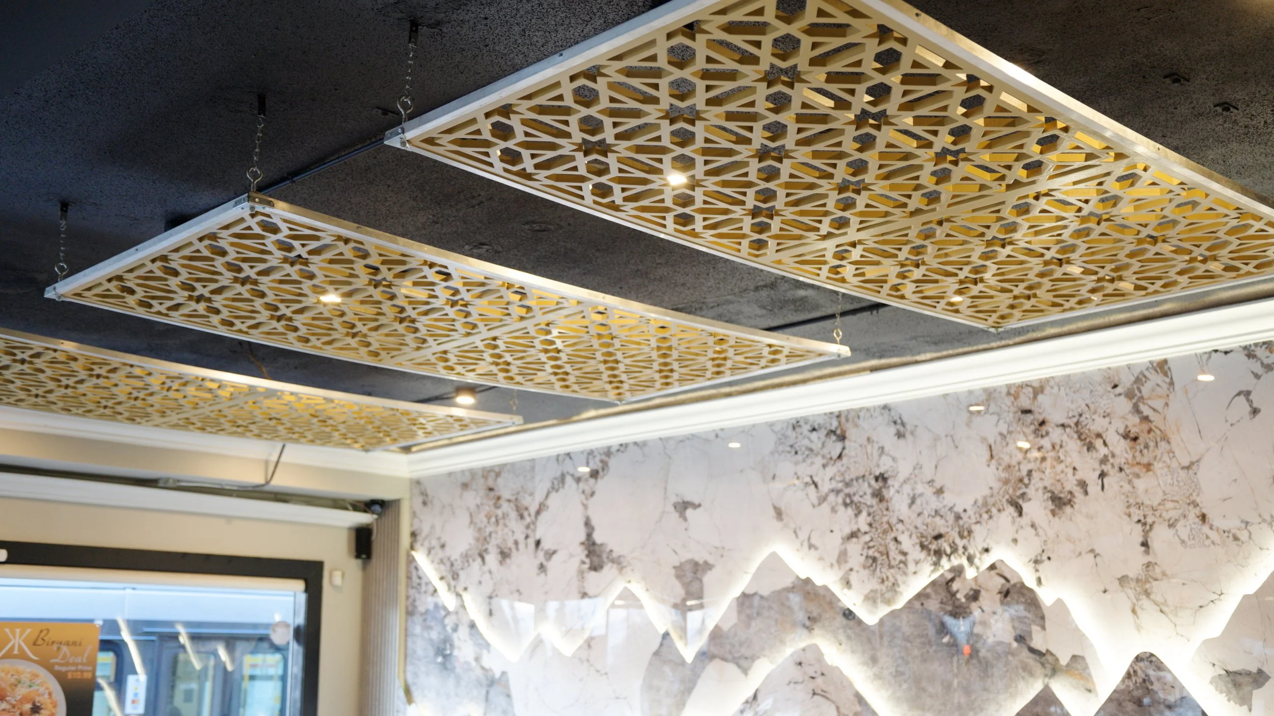 Mesmerizing Design Panels on Ceiling to provide amazing dining hall experience