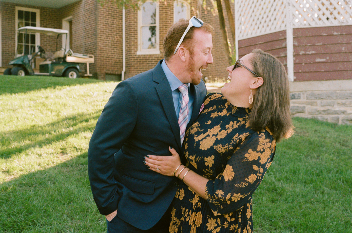 Couple laughing by CT film photographer Briana Raucci