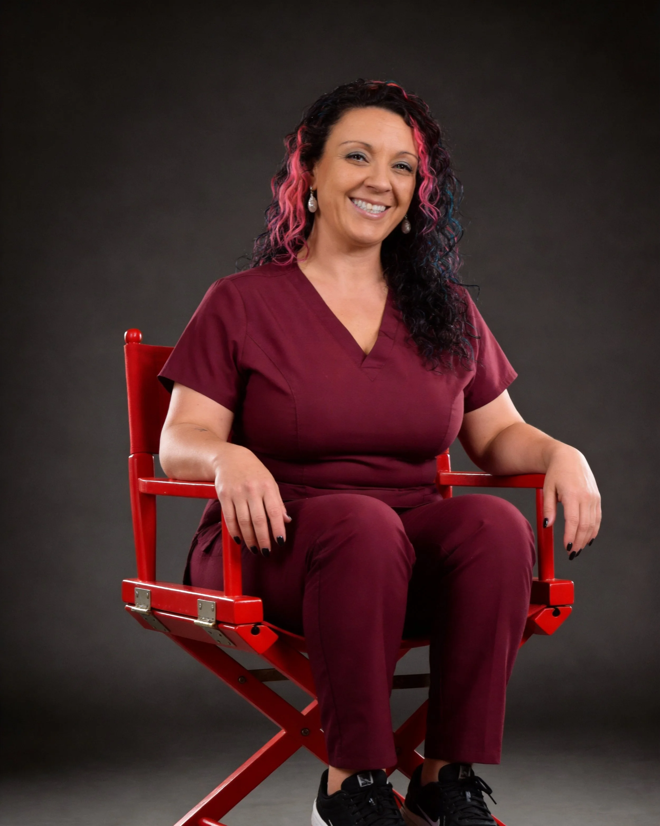 Professional portrait of Jacquelyn Fanno, founder and Certified Massage Therapist at Eros & Essence wellness studio in Tarzana, CA.