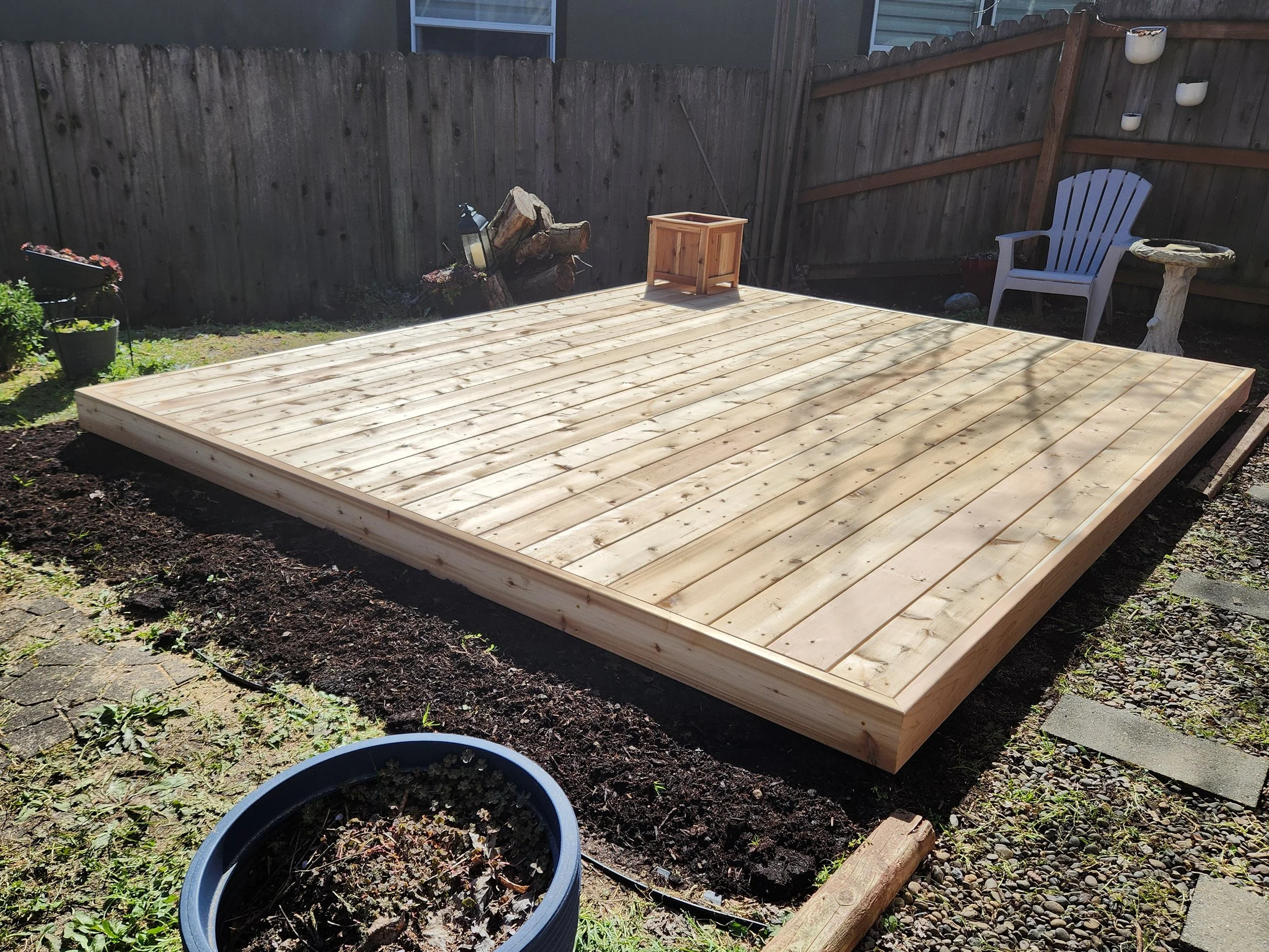 A backyard patio newly constructed with western red cedar.