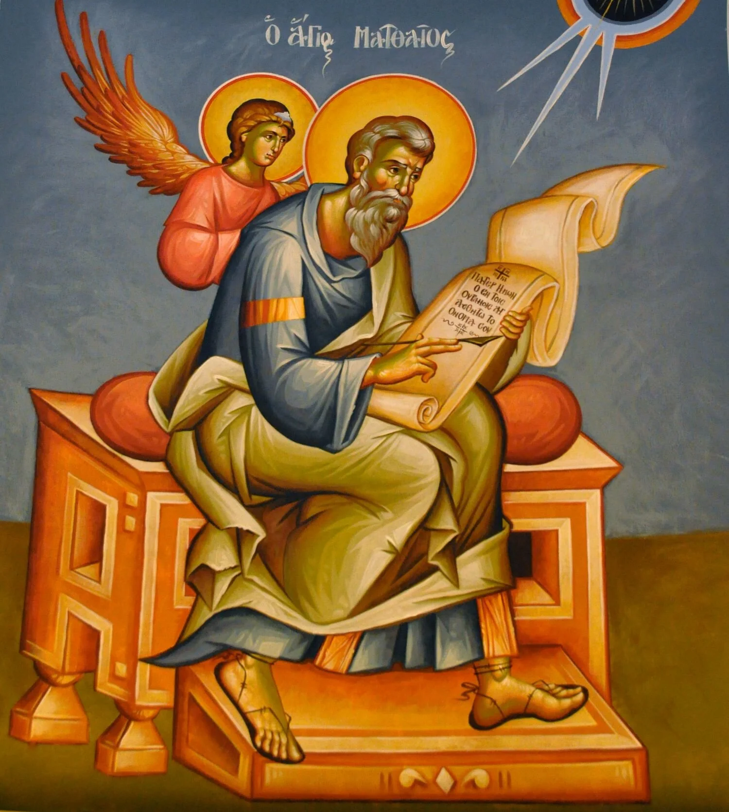 Saint Matthew Writing Gospel Icon.jpeg