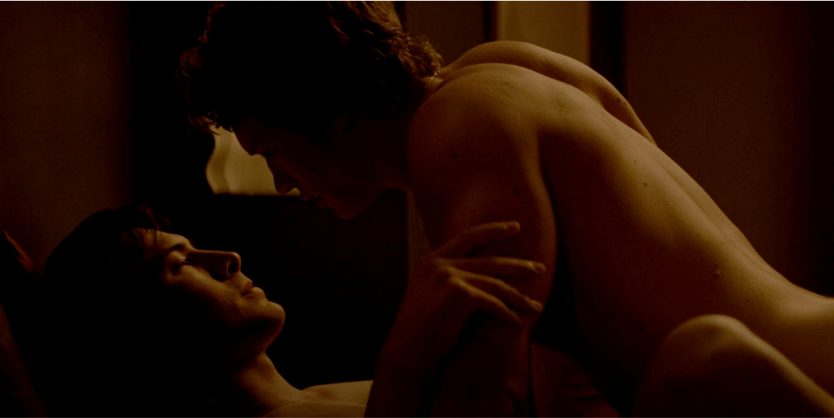 Shows Shane and Ilya from the waist up in bed. Ilya is lying on Shane and he’s about to say “You think I am asshole?”